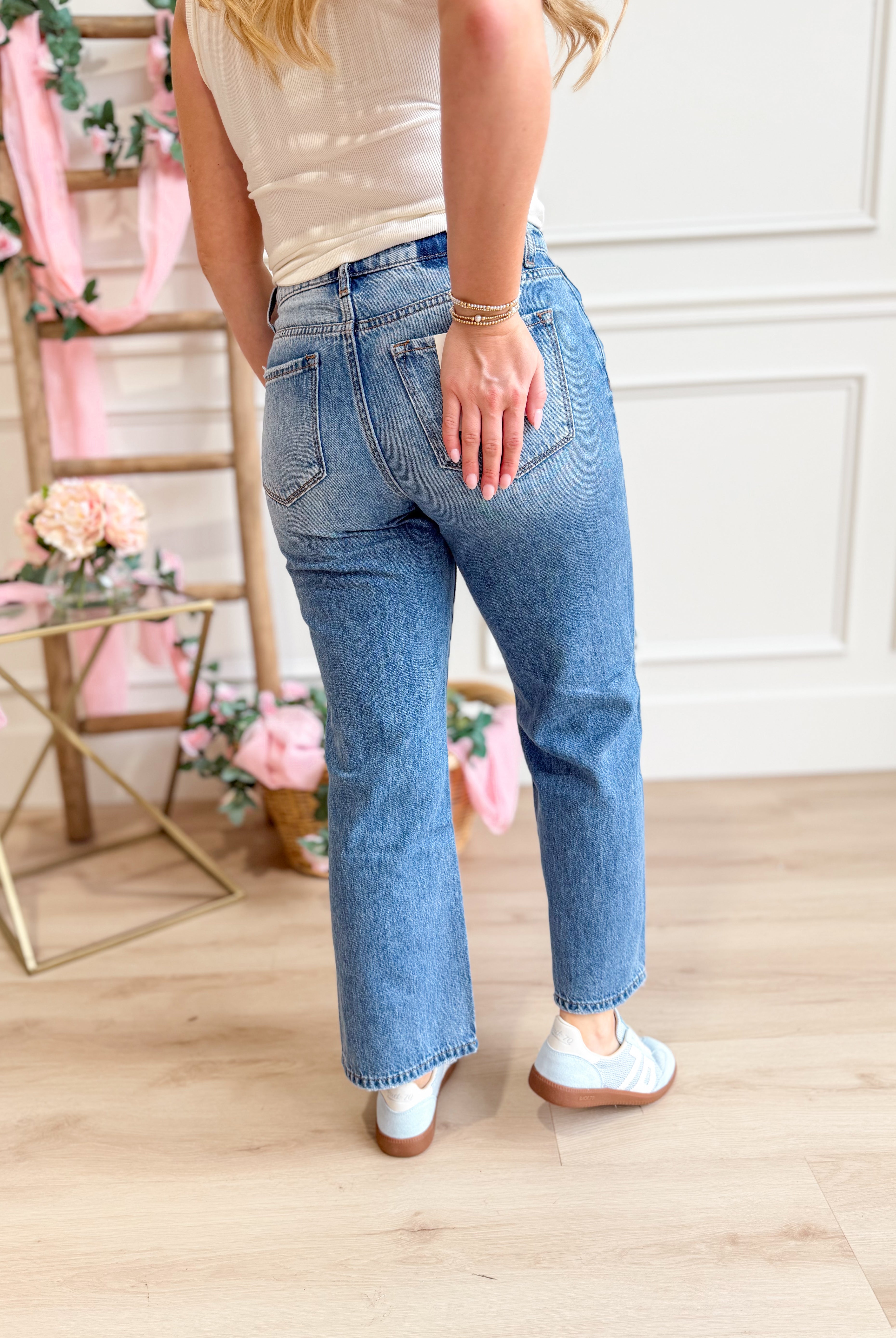 Vervet Frannie high-rise relaxed straight jeans in light wash denim, front view showing classic five-pocket design and straight leg fit.