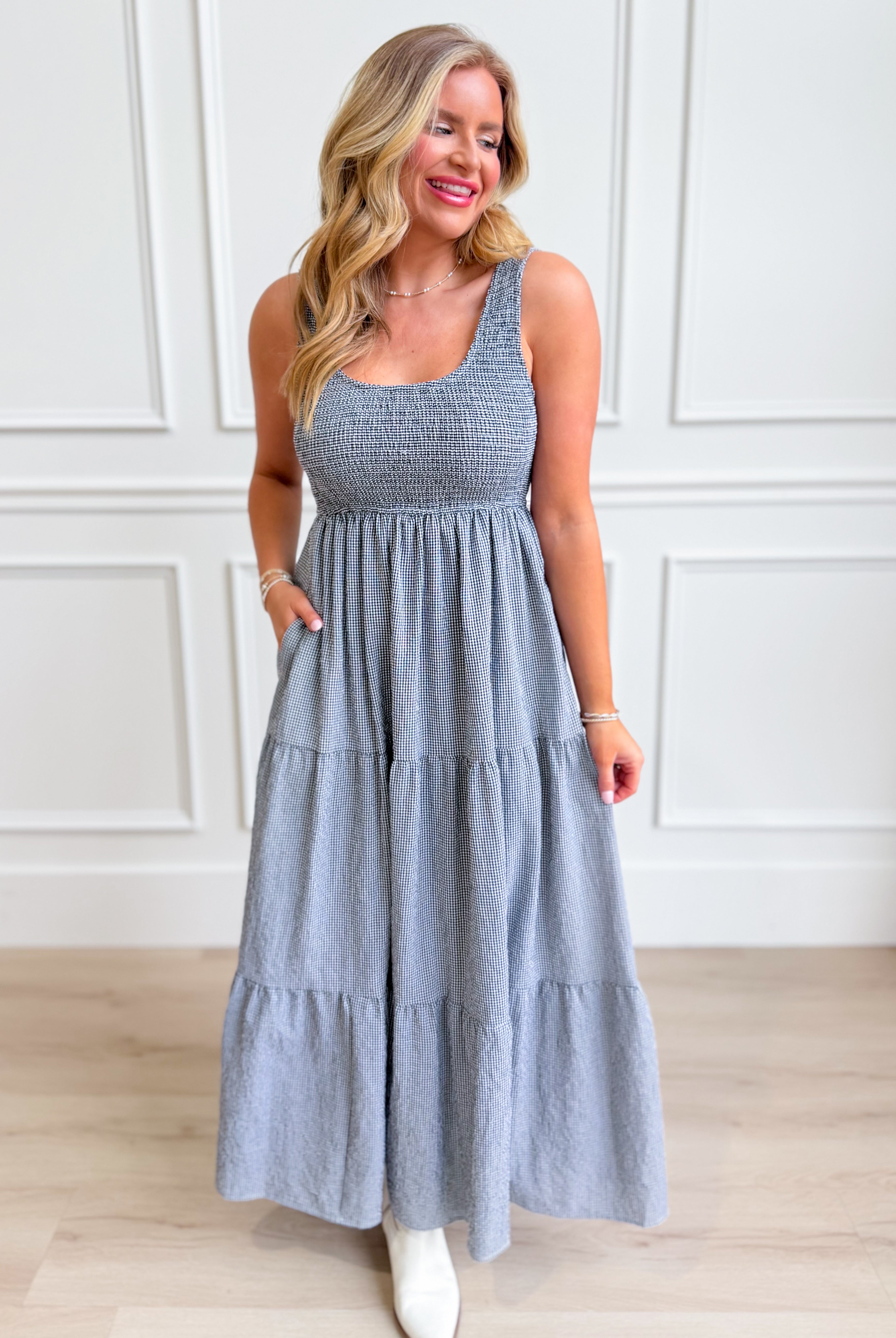 Baevely Painter Gingham Midi Dress, a stylish dressy dress with a painterly gingham pattern and midi length, worn by a model.