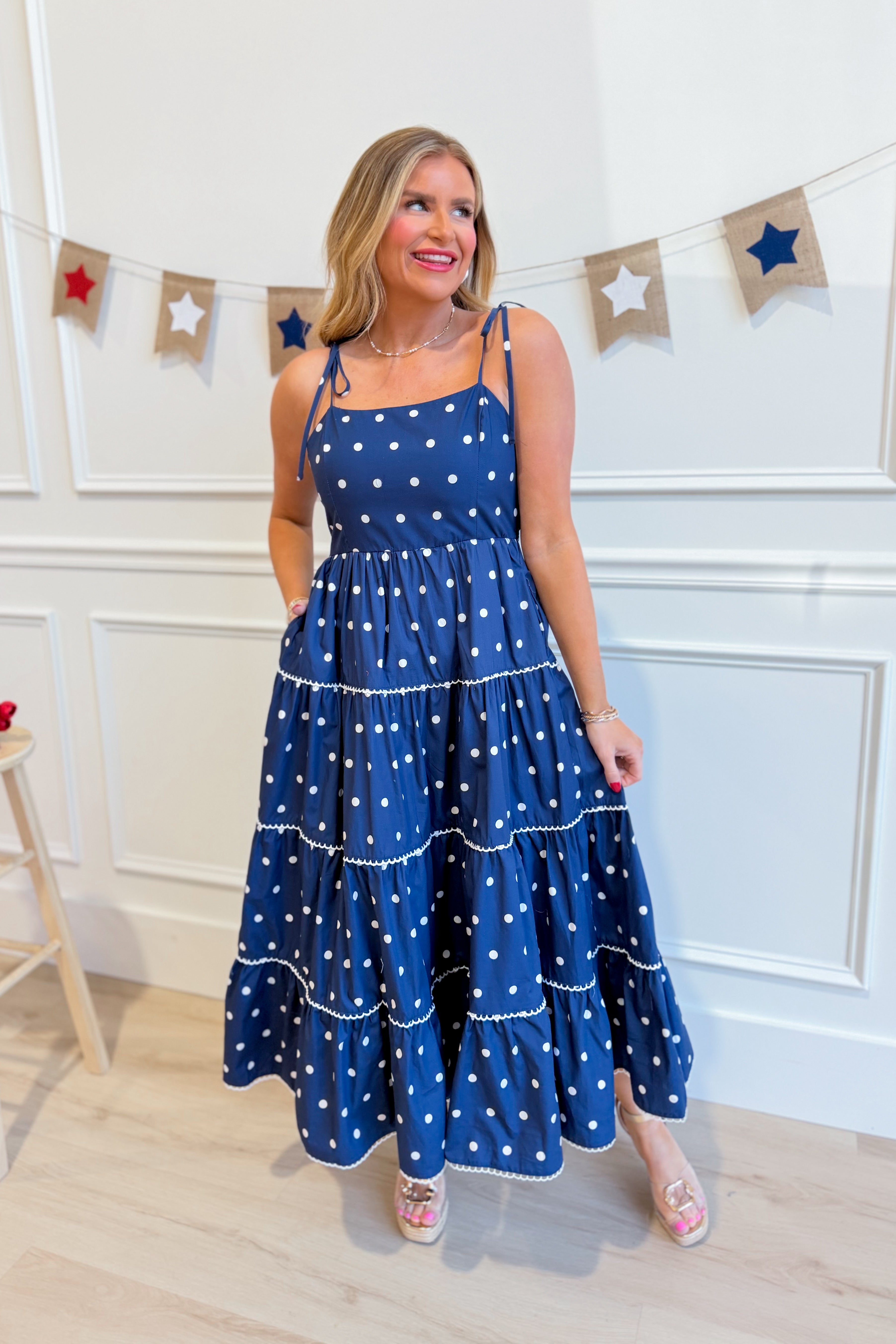 Vicki Polka Dot Tiered Midi Dress by PEACH LOVE featuring a flowy, tiered design with polka dot pattern for casual wear.