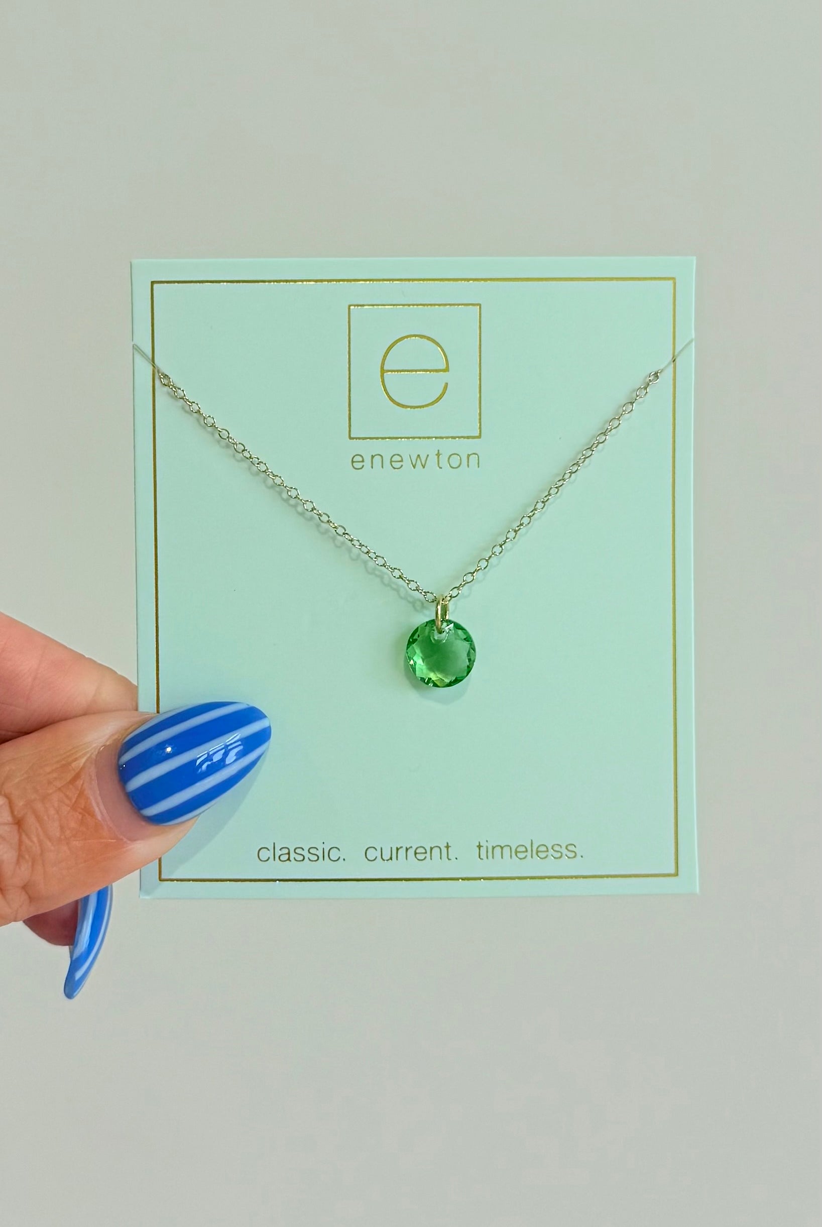 Enewton 16-inch classic birthstone necklace with a sparkling gemstone pendant on a silver chain.