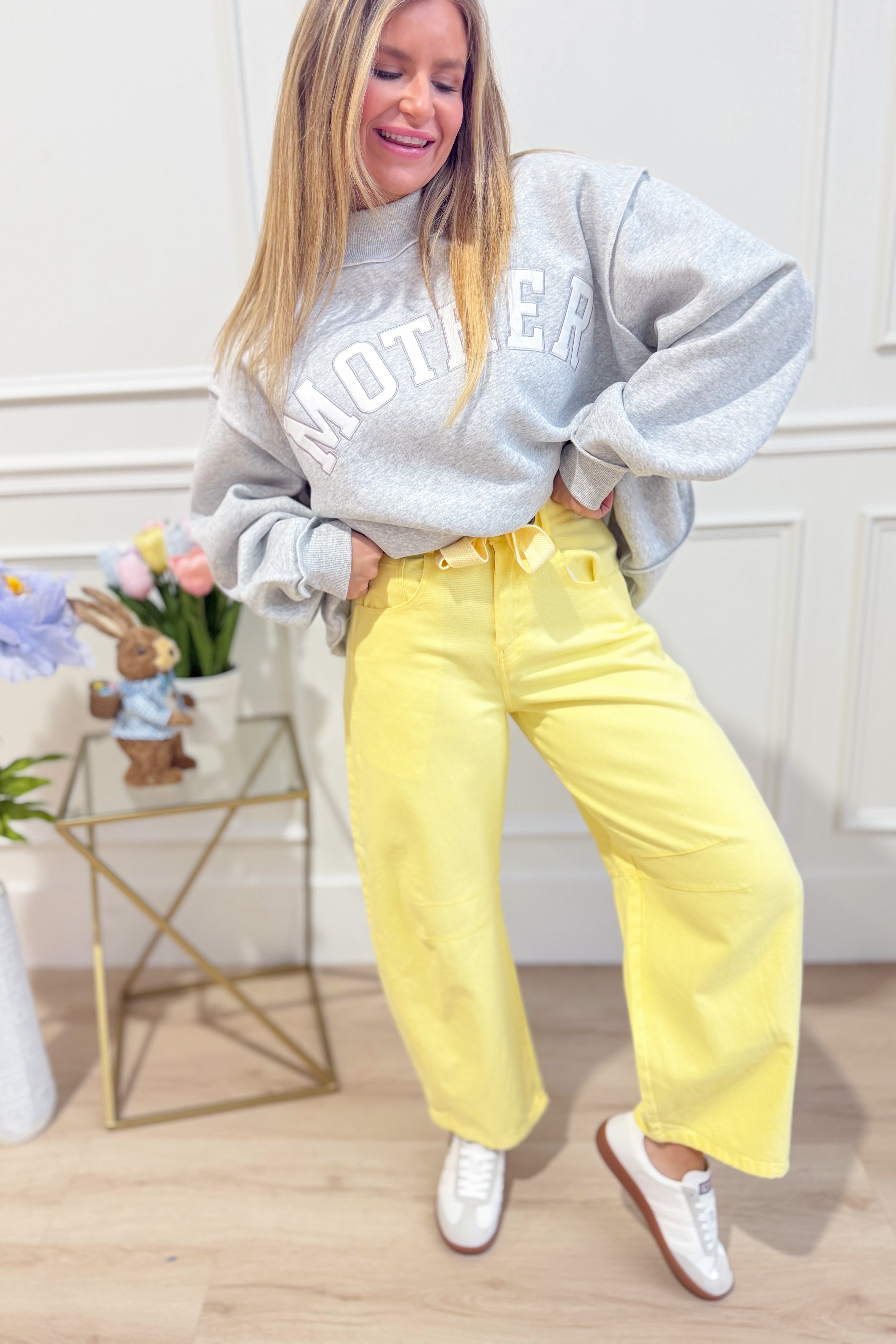 Light yellow mineral washed PEACH LOVE Candice 147 novelty barrel jeans with eyelet details and relaxed fit.