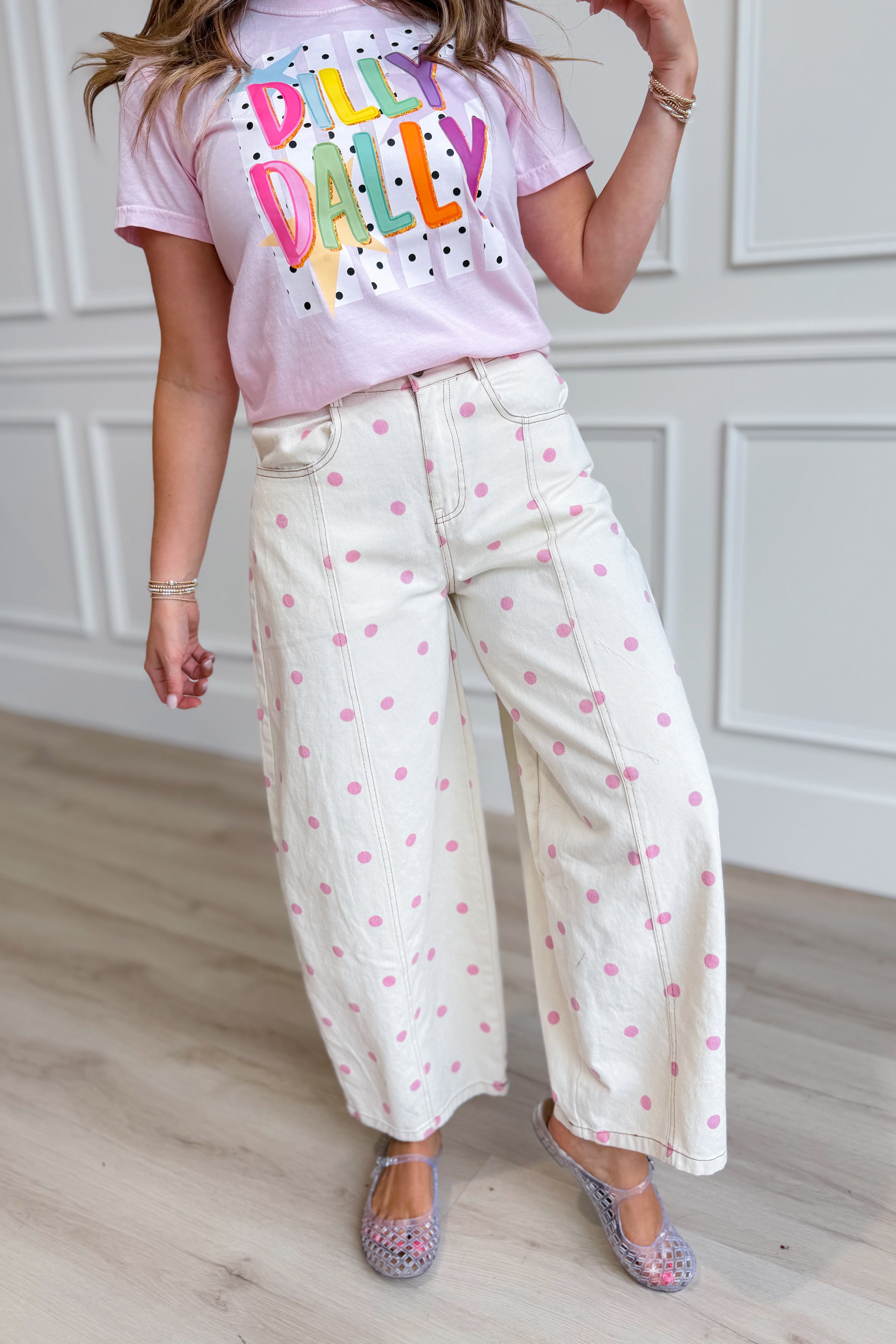 Pink polka dot barrel jeans from PEACH LOVE's 147 Novelty Jeans collection, featuring a high-waisted, relaxed fit with playful polka dots.