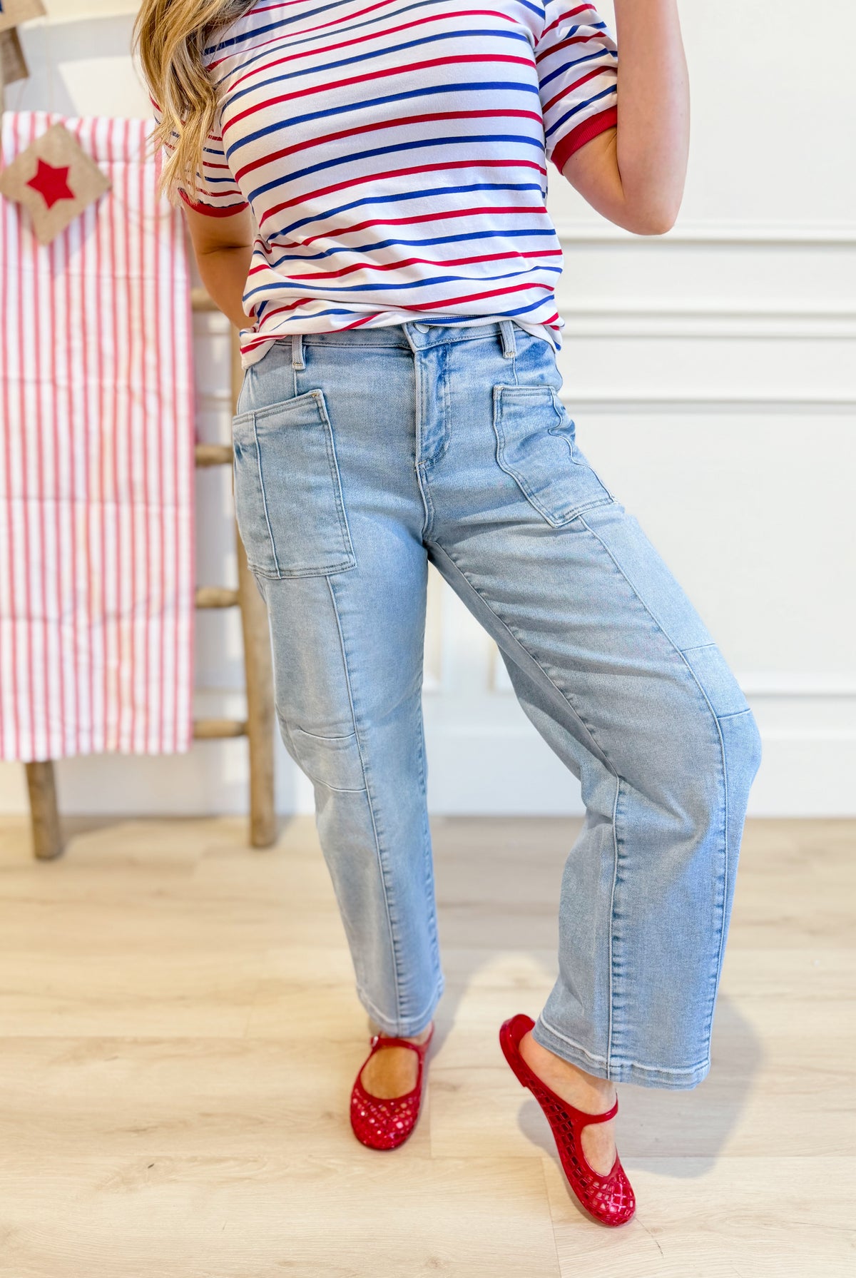 Risen Fredrick slouchy ankle boyfriend jeans in light wash denim, shown folded with distressed details and relaxed fit.