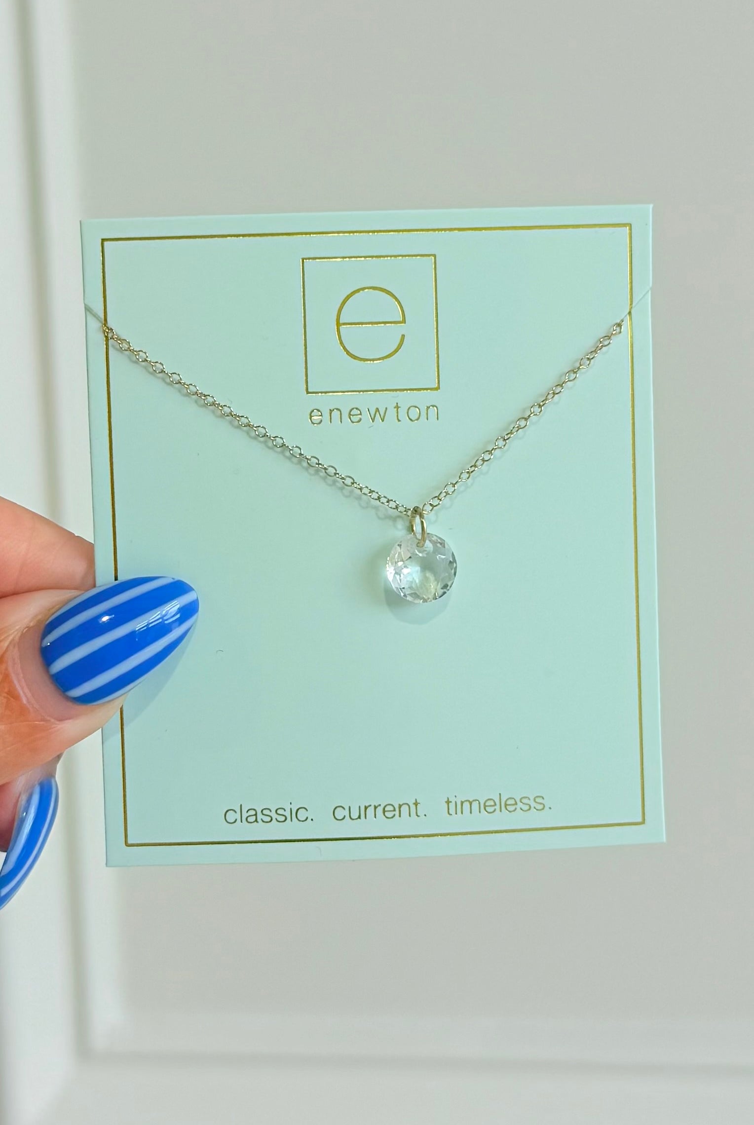 Enewton 16-inch classic birthstone necklace featuring a sparkling gemstone pendant on a silver chain.