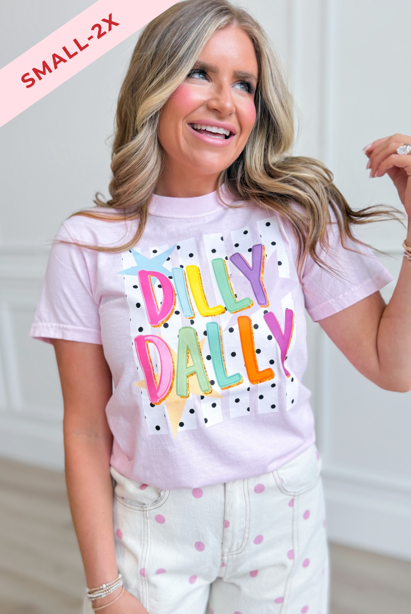 Colorful Dilly Dally graphic T-shirt from TWN BOUTIQUE featuring vibrant multi-color print on soft cotton fabric.