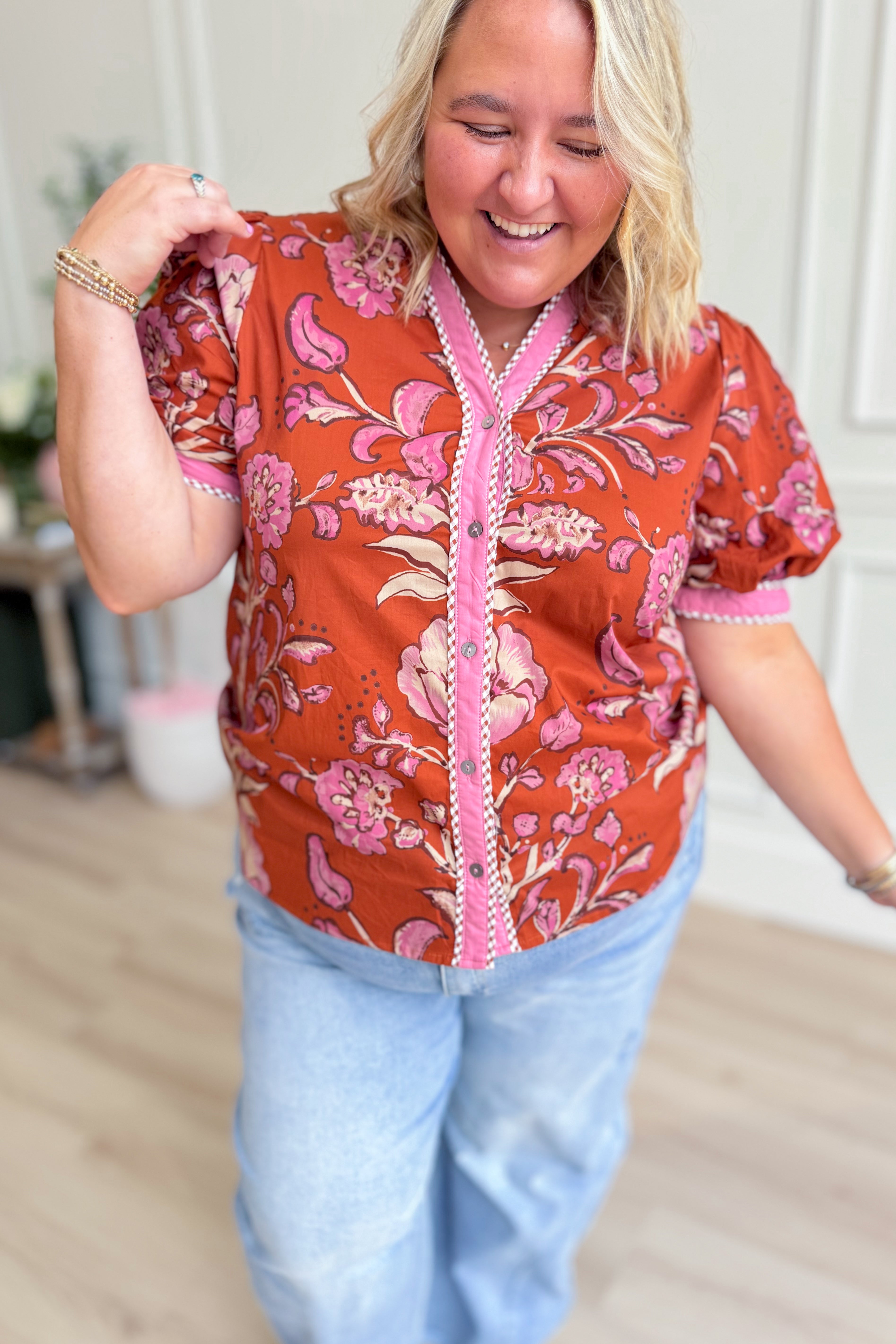 ENTRO Miley floral printed dressy top with contrasting trim, stylish and lightweight for casual or semi-formal wear.