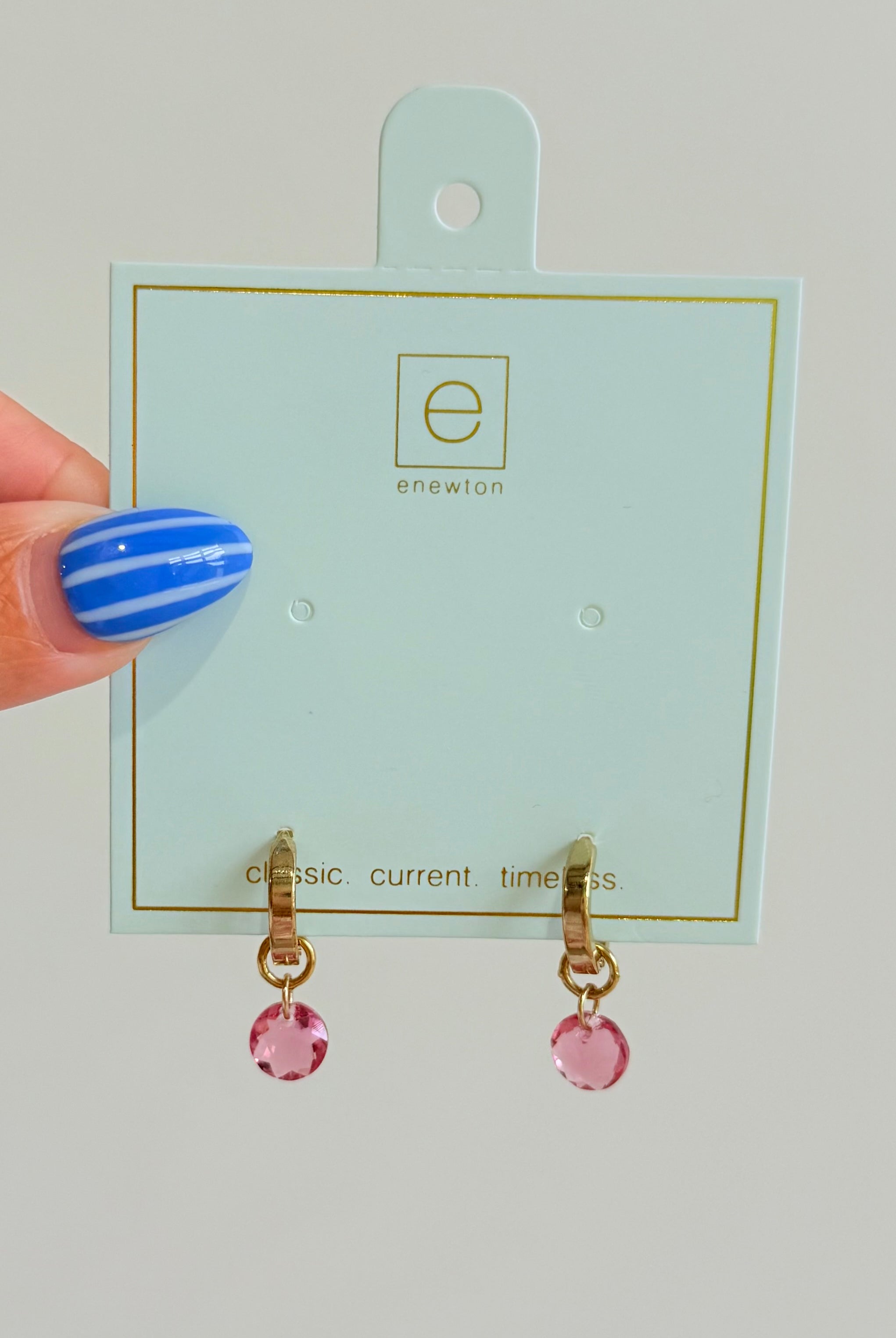 Enewton .5mm Classic Birthstone Huggie earrings with colorful gemstones in 222 other jewelry style, close-up shot.