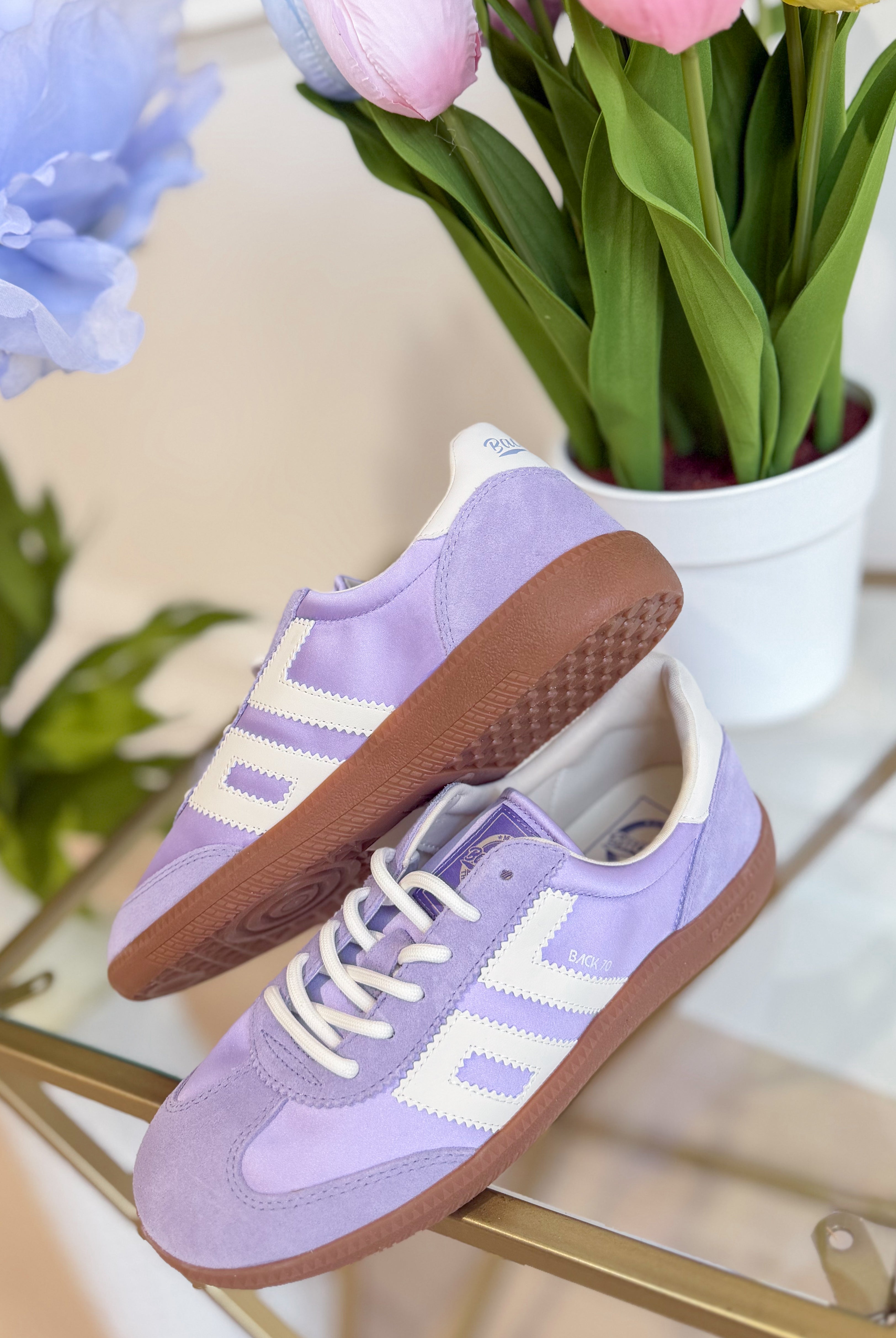 BACK70 Ghost Sneakers in violet, 205 sneaker style, showcasing sleek design and vibrant color on a clean background.