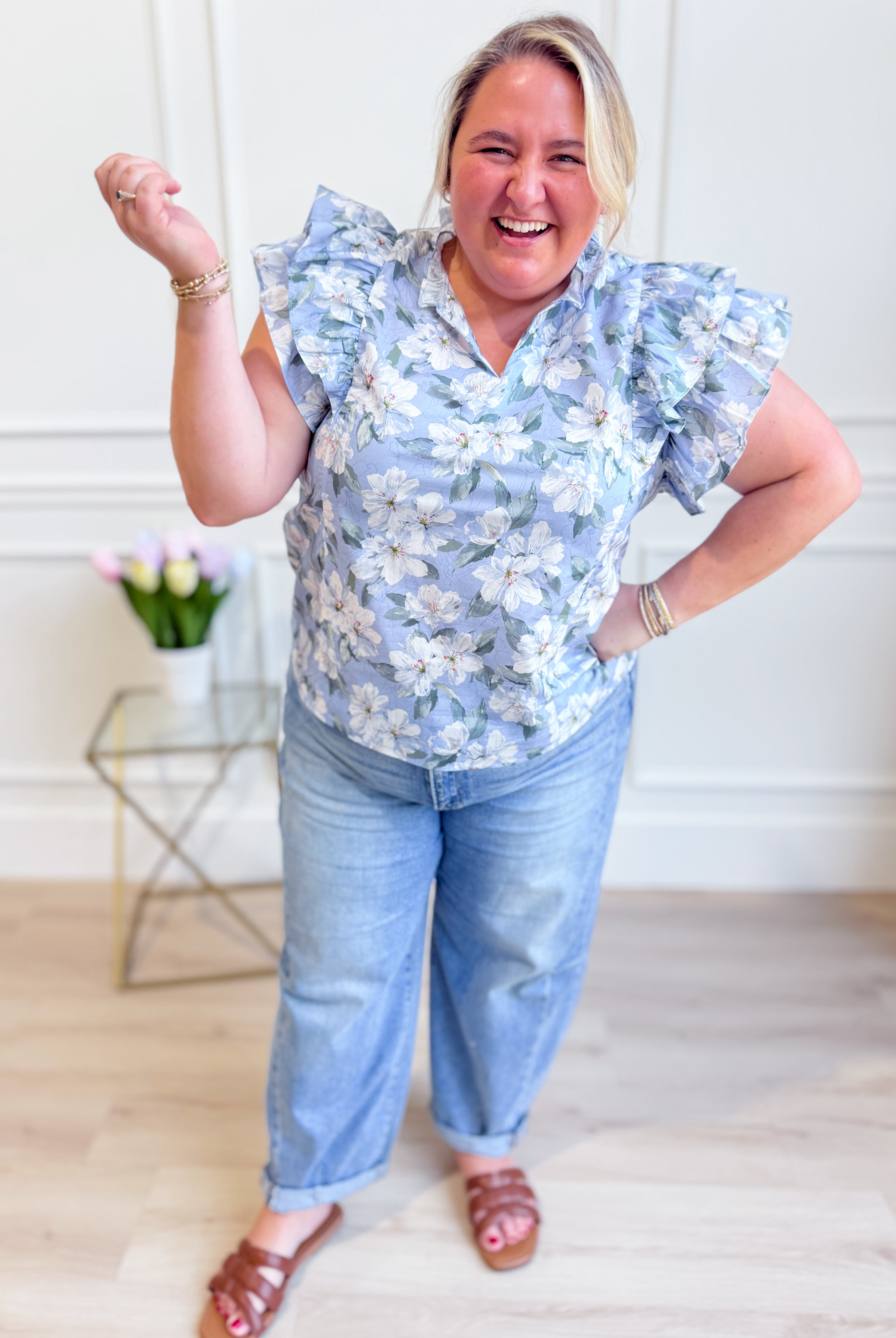 SHE + SKY Lori ruffle sleeve printed top from 131 Spring Sweaters collection, featuring ruffled sleeves and vibrant print.