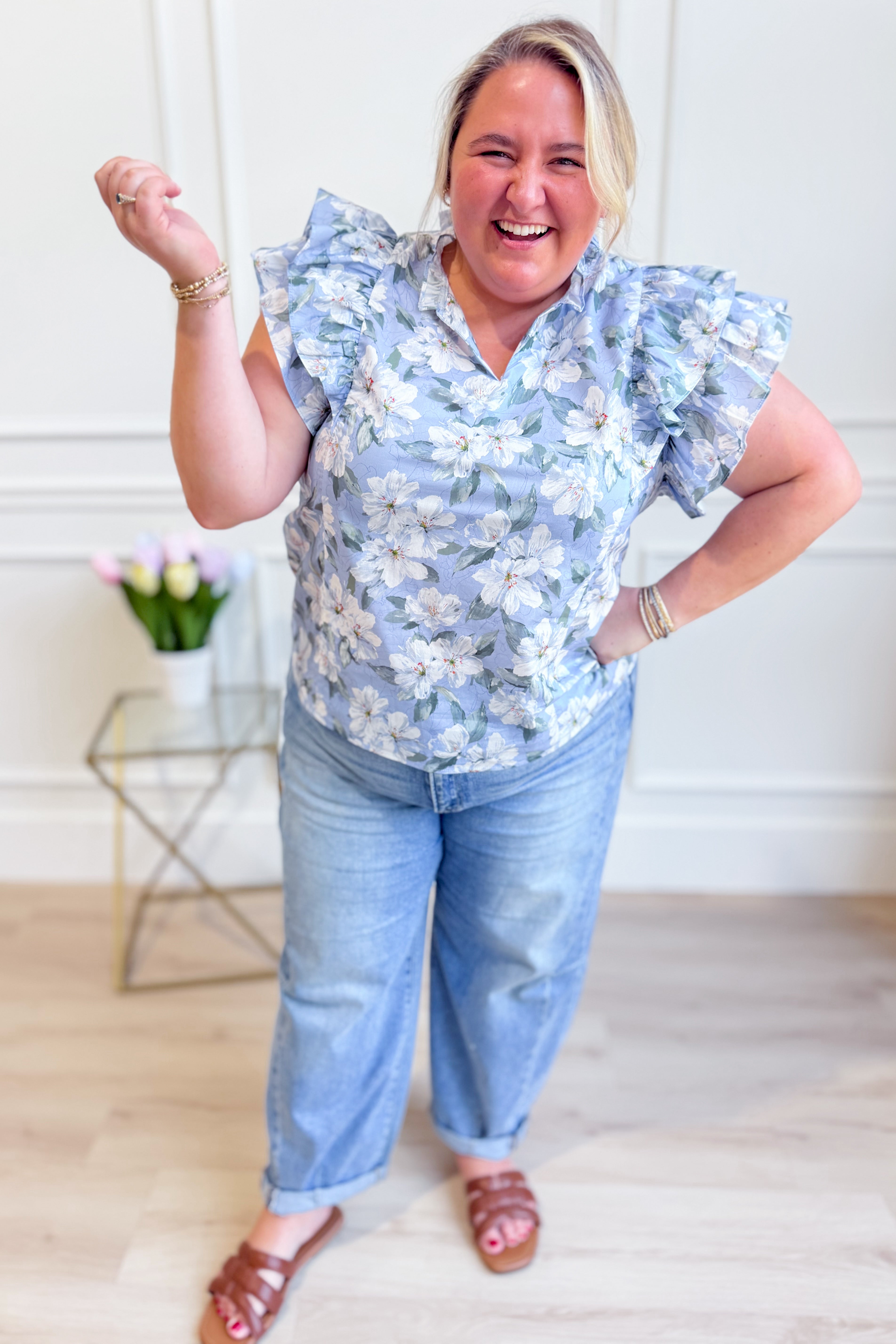 SHE + SKY Lori ruffle sleeve printed top from 131 Spring Sweaters collection, featuring ruffled sleeves and vibrant print.