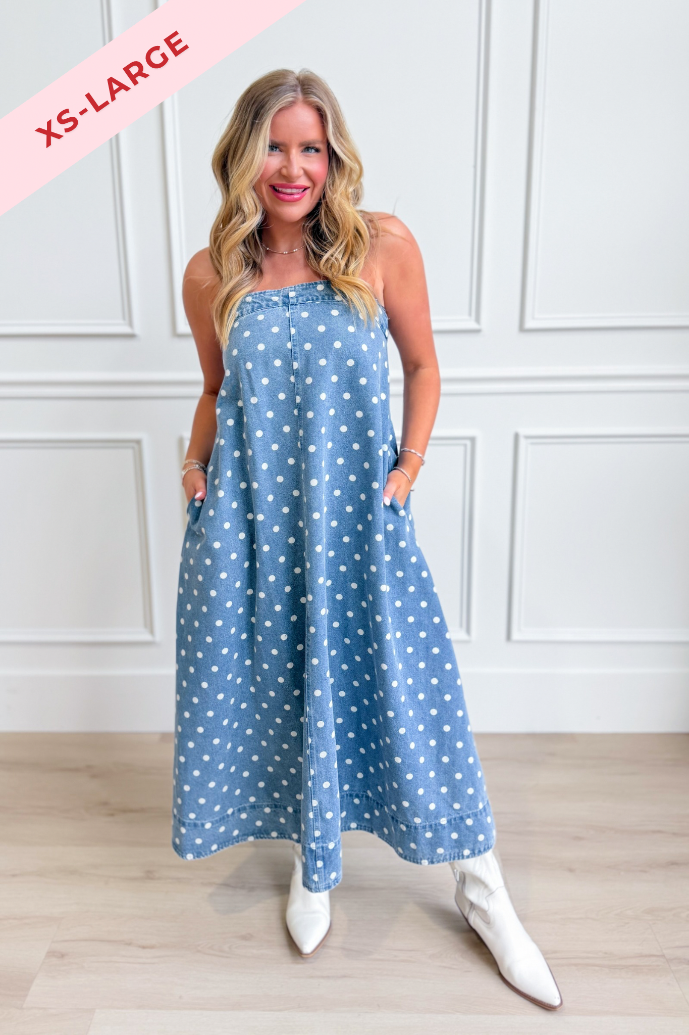 Aureum Mia Polka Dot Denim Dress featuring a stylish dressy design with a fitted waist and polka dot pattern.