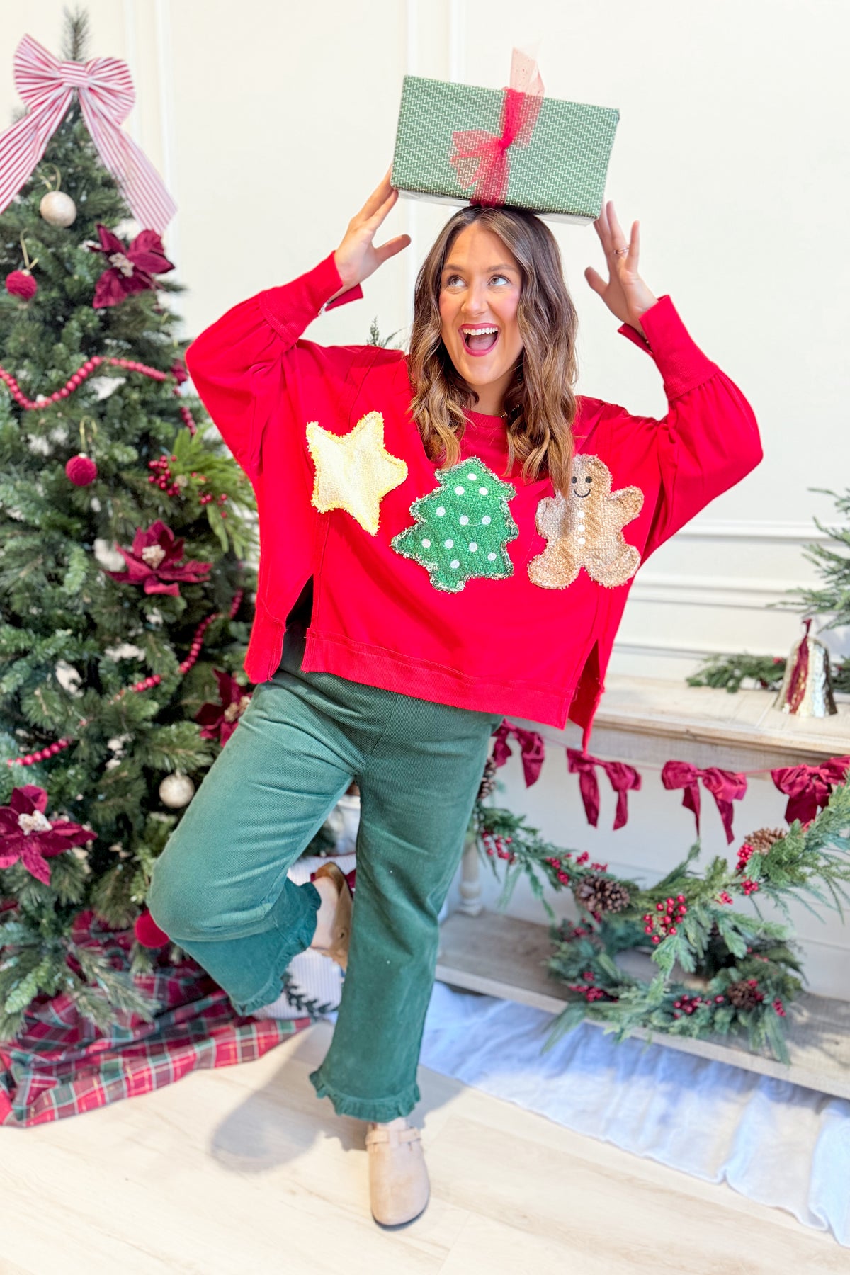 PEACH LOVE Tweed Christmas Patch Pullover Sweatshirt featuring festive holiday patch design and cozy graphic sweatshirt style.