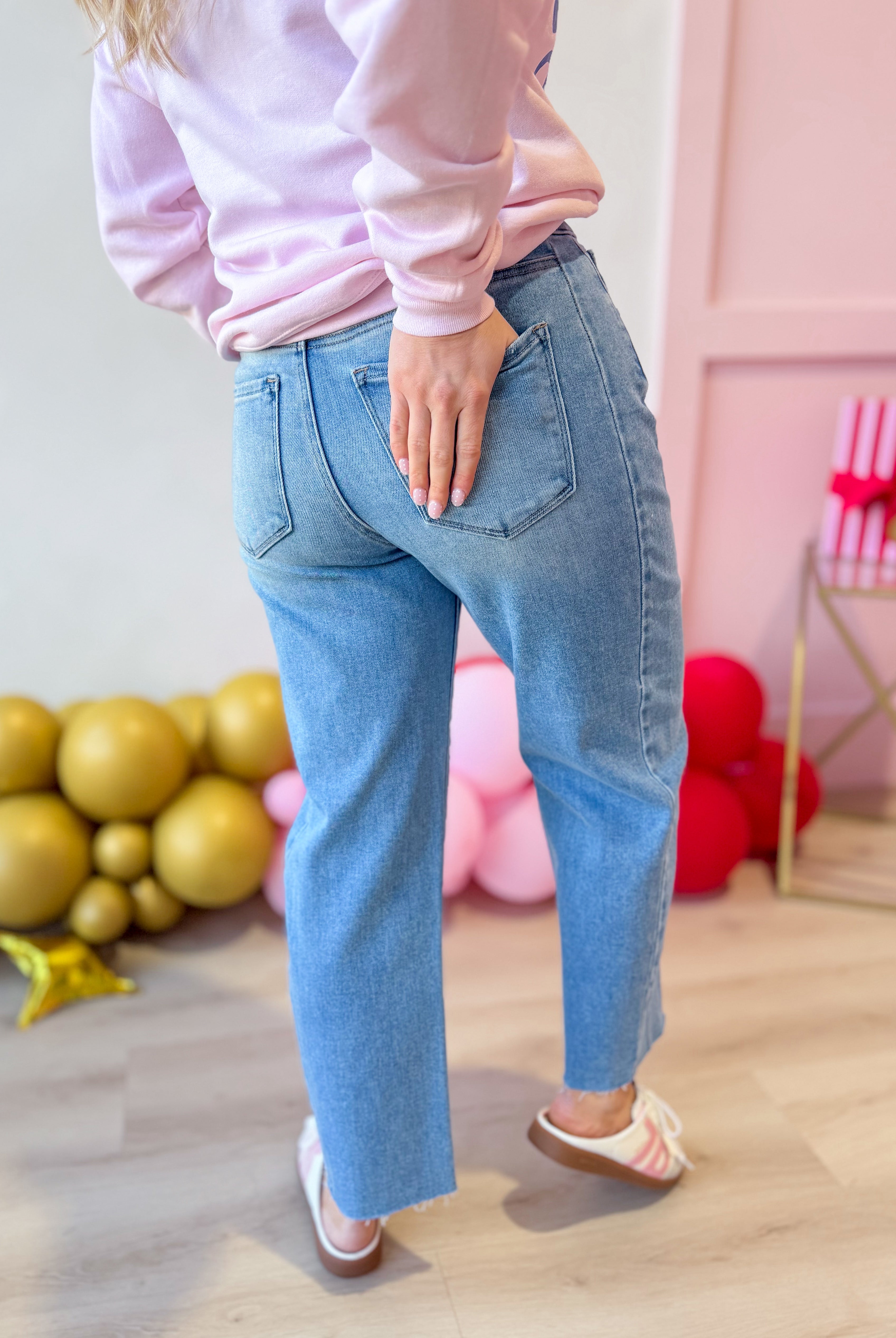 RISEN Boone high rise slouchy cropped barrel jeans in light wash denim, showcasing relaxed fit and trendy style.