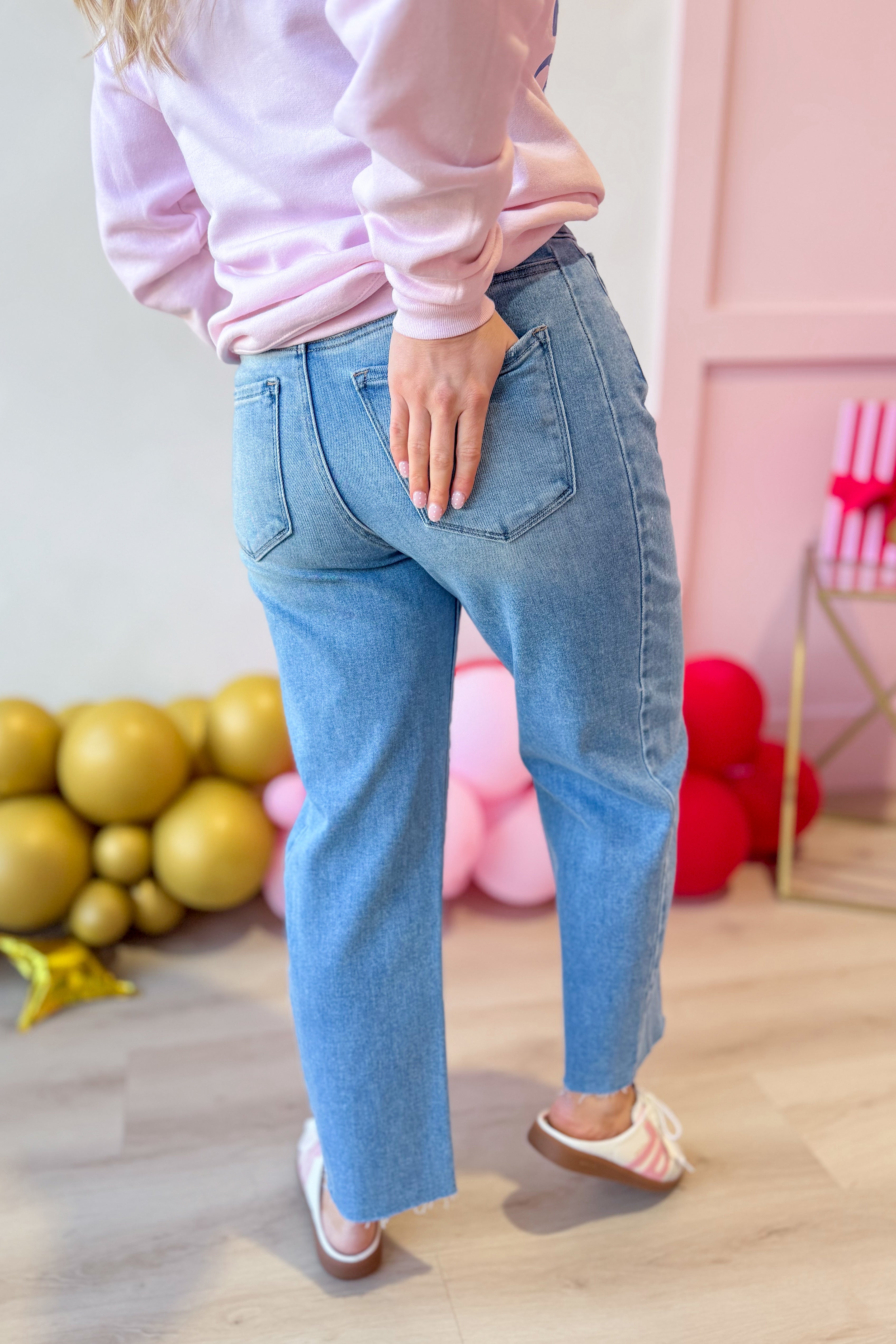 RISEN Boone high rise slouchy cropped barrel jeans in light wash denim, showcasing relaxed fit and trendy style.