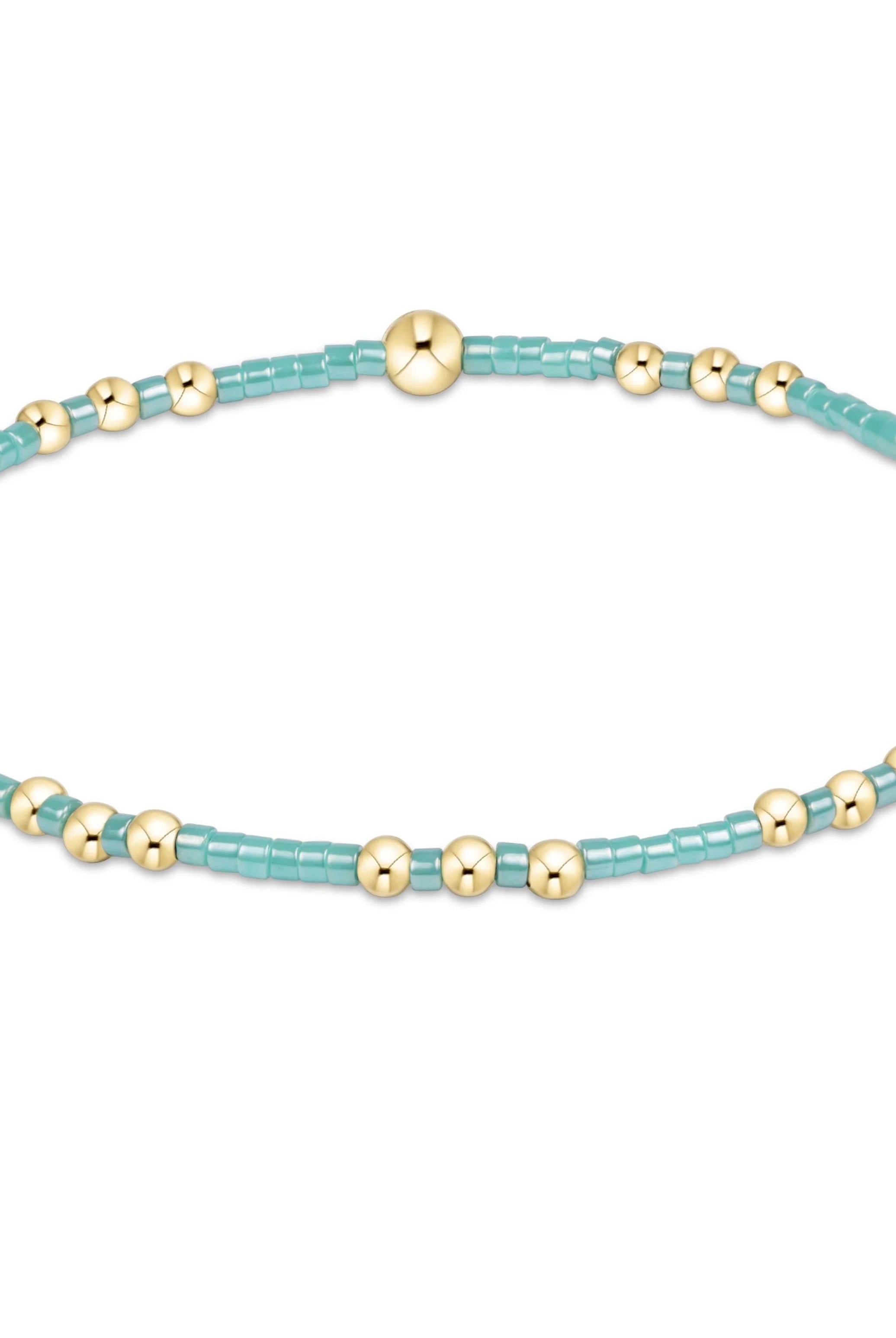 Enewton Spring Summer Hope Joy bracelet with colorful beads and charm on a white background.
