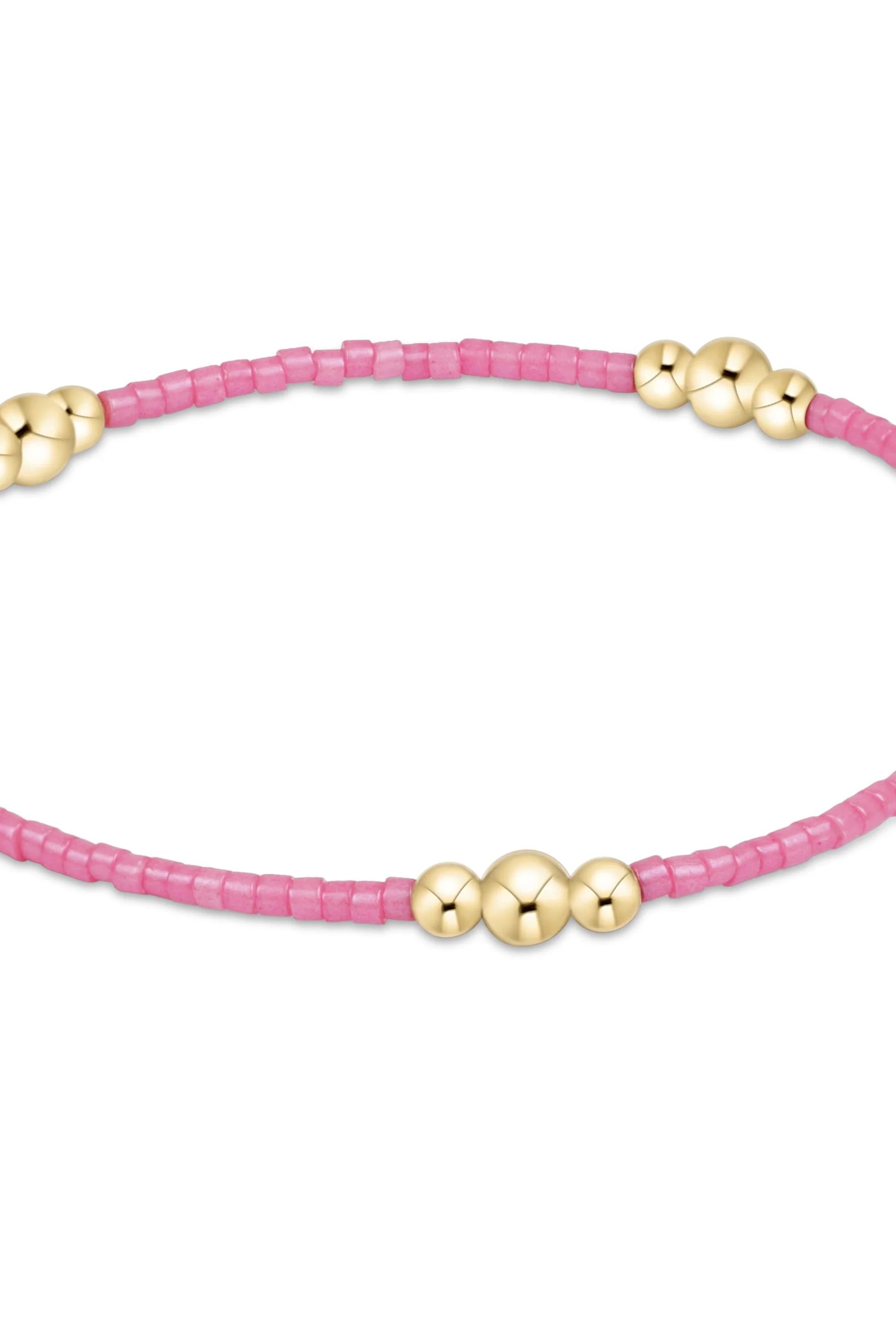 Enewton Bubblegum Hope Purpose Gold Bracelet featuring a sleek gold chain and a small charm with bubblegum and hope motifs.