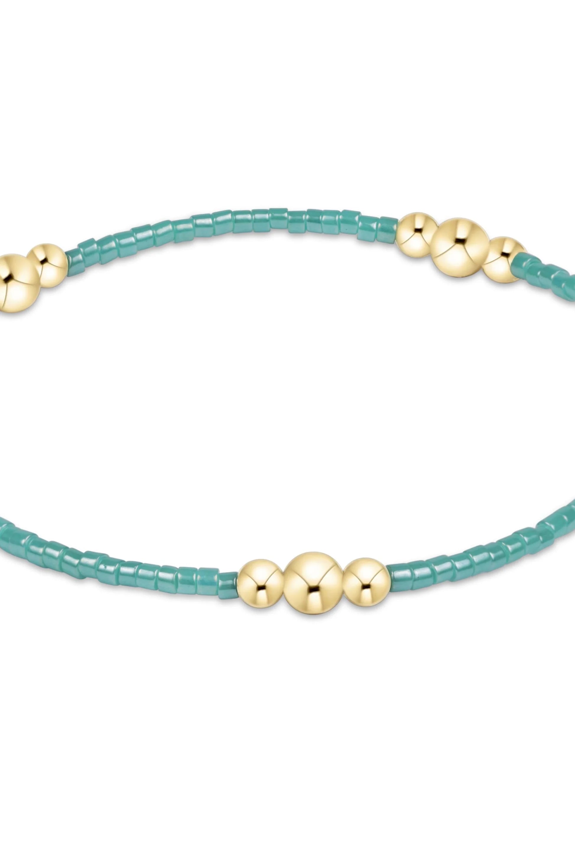 Enewton Sea Glass Hope Purpose Gold Bracelet featuring sea glass beads and a gold chain, elegant jewelry accessory.