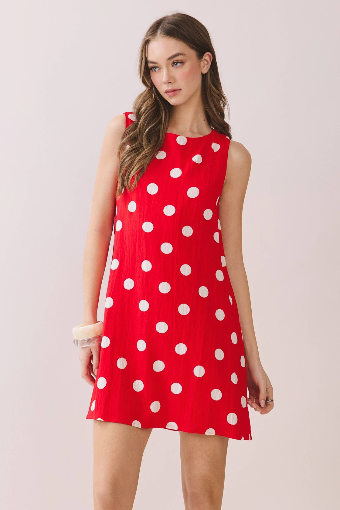 TCEC Gina polka dot print sleeveless shift dress with a casual fit, featuring a classic polka dot pattern and sleeveless design.