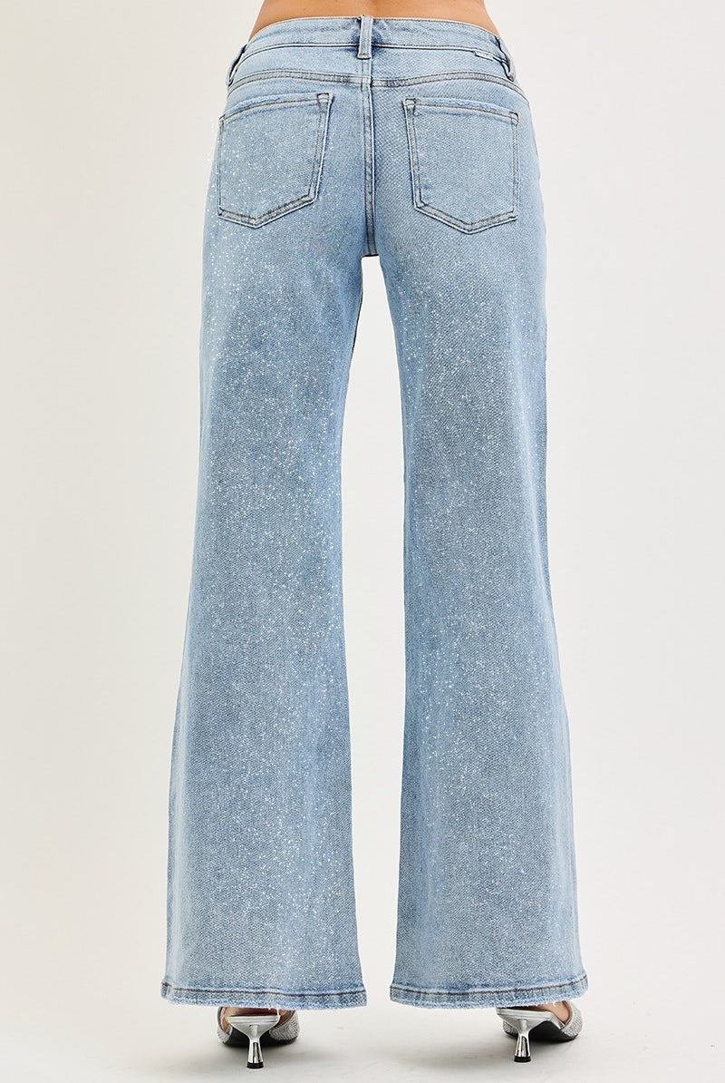 Risen Conrad mid-rise shimmer wide-leg jeans in light lurex fabric, featuring a relaxed fit and stylish design.