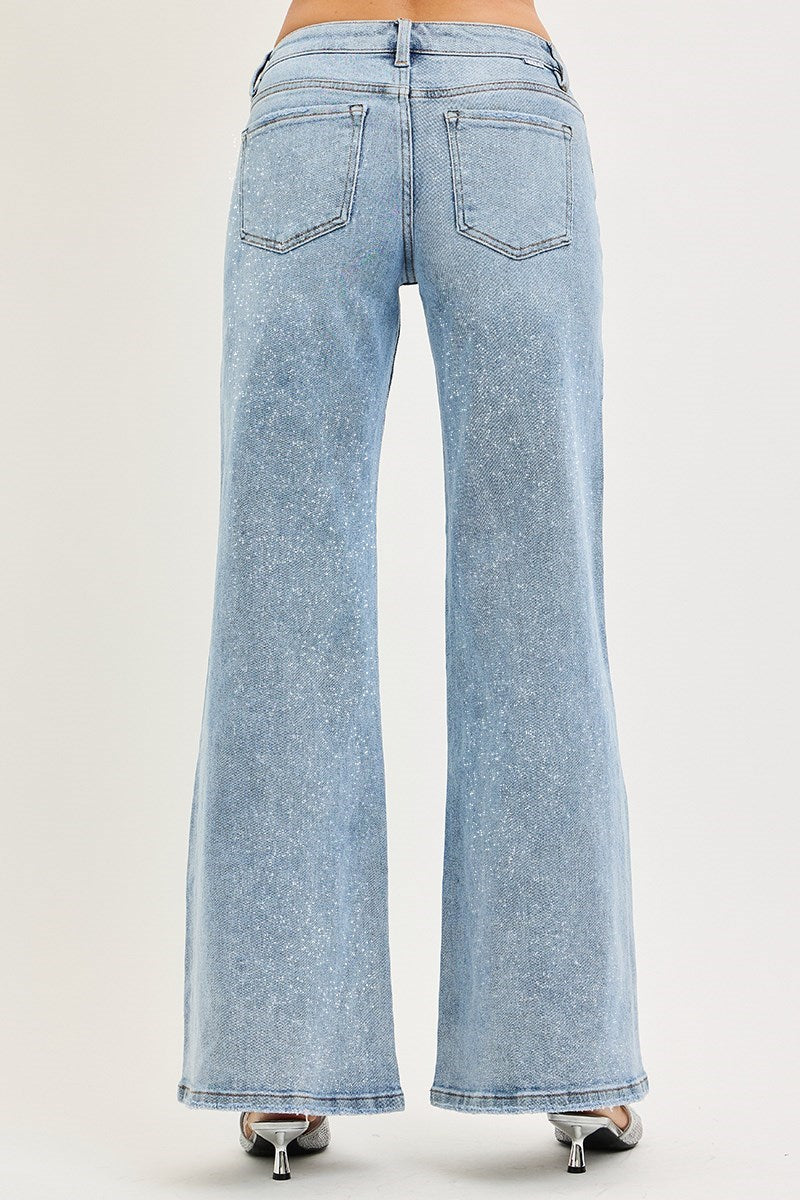 Risen Conrad mid-rise shimmer wide-leg jeans in light lurex fabric, featuring a relaxed fit and stylish design.