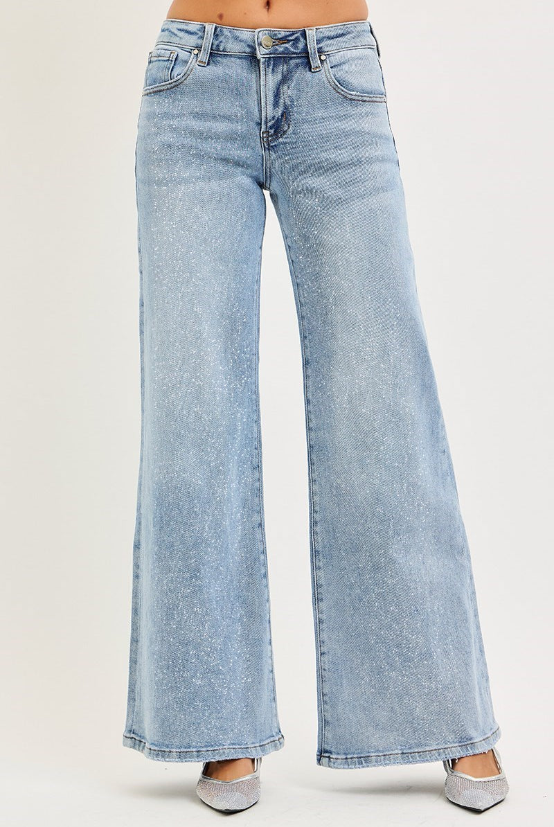 Risen Conrad mid-rise shimmer wide-leg jeans in light lurex fabric, showcasing the stylish design and relaxed fit.