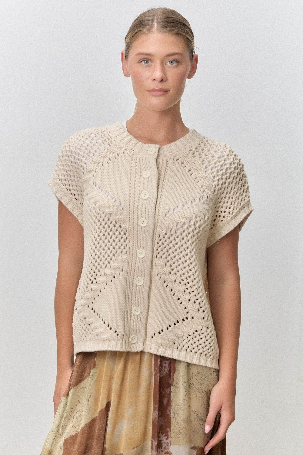 Baevly Bryer Button Up Sweater Vest in fall sweater style, featuring a classic button front and cozy knit fabric.