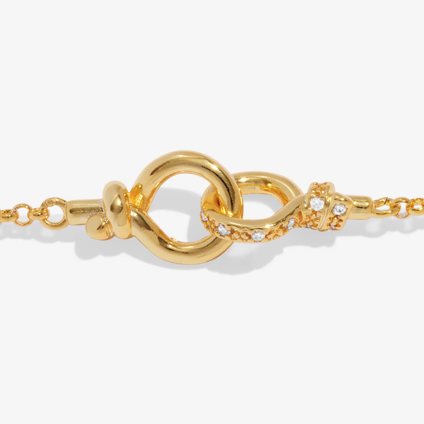A LITTLES & CO Evermore Linked Knot bracelet with intertwined silver links on a neutral background.