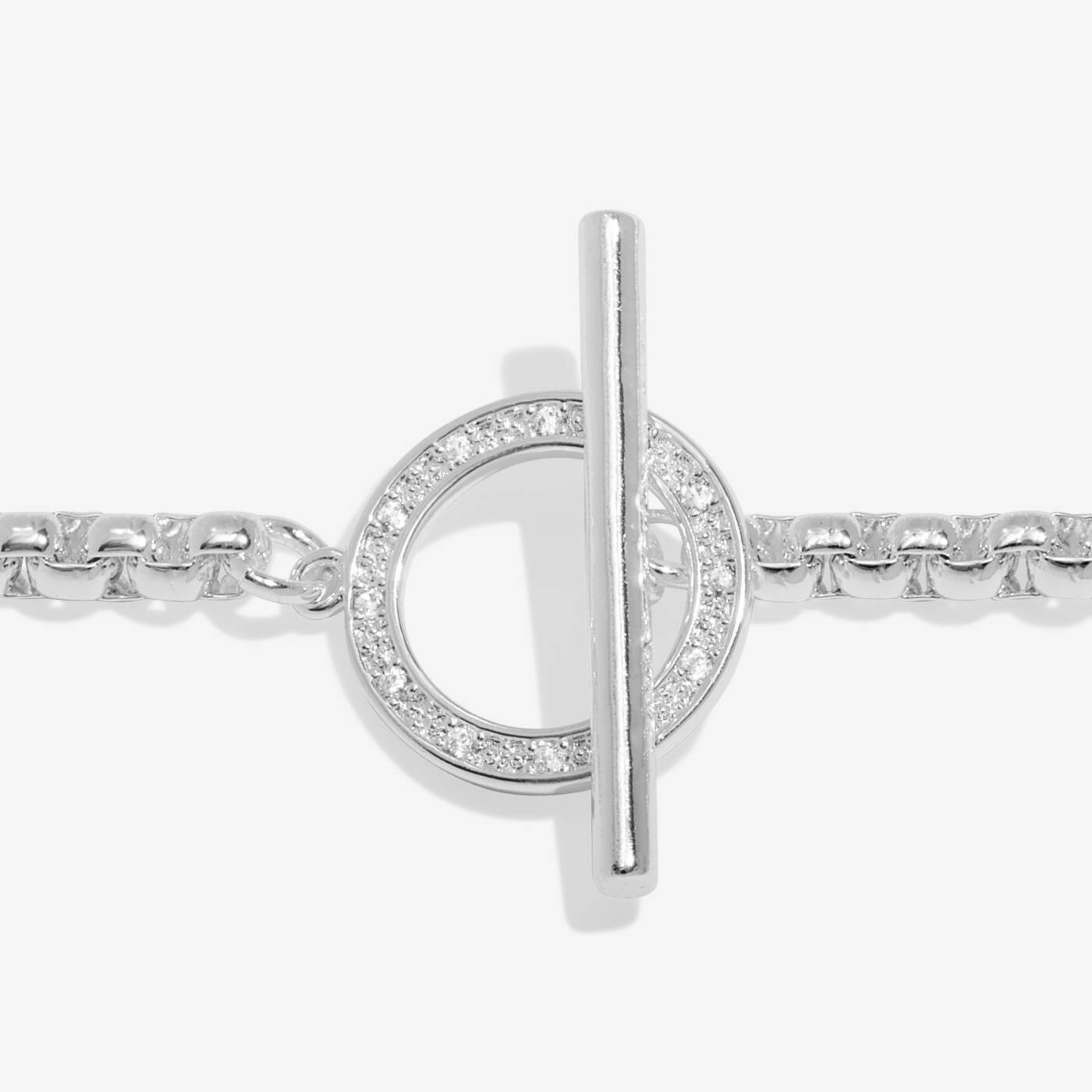 A LITTLES & CO Evermore Circle T Bar bracelet featuring a sleek silver design with a circular charm and T bar closure.