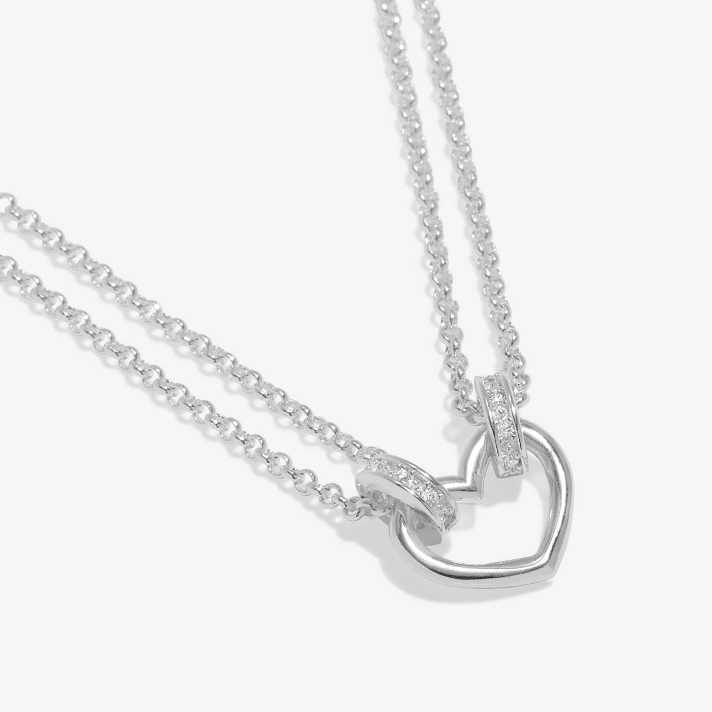 A LITTLES & CO Evermore Heart 15 3/4" necklace featuring a delicate heart pendant on a fine chain.