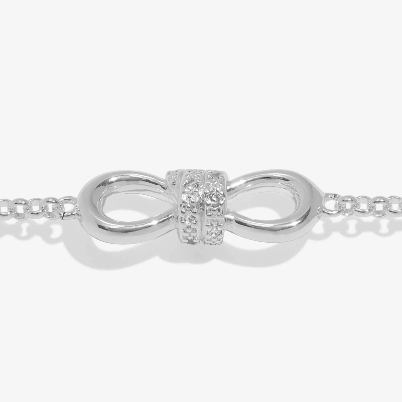 A A LITTLES & CO Evermore Infinity Knot bracelet in silver with a smooth, polished finish, showcasing its elegant design.