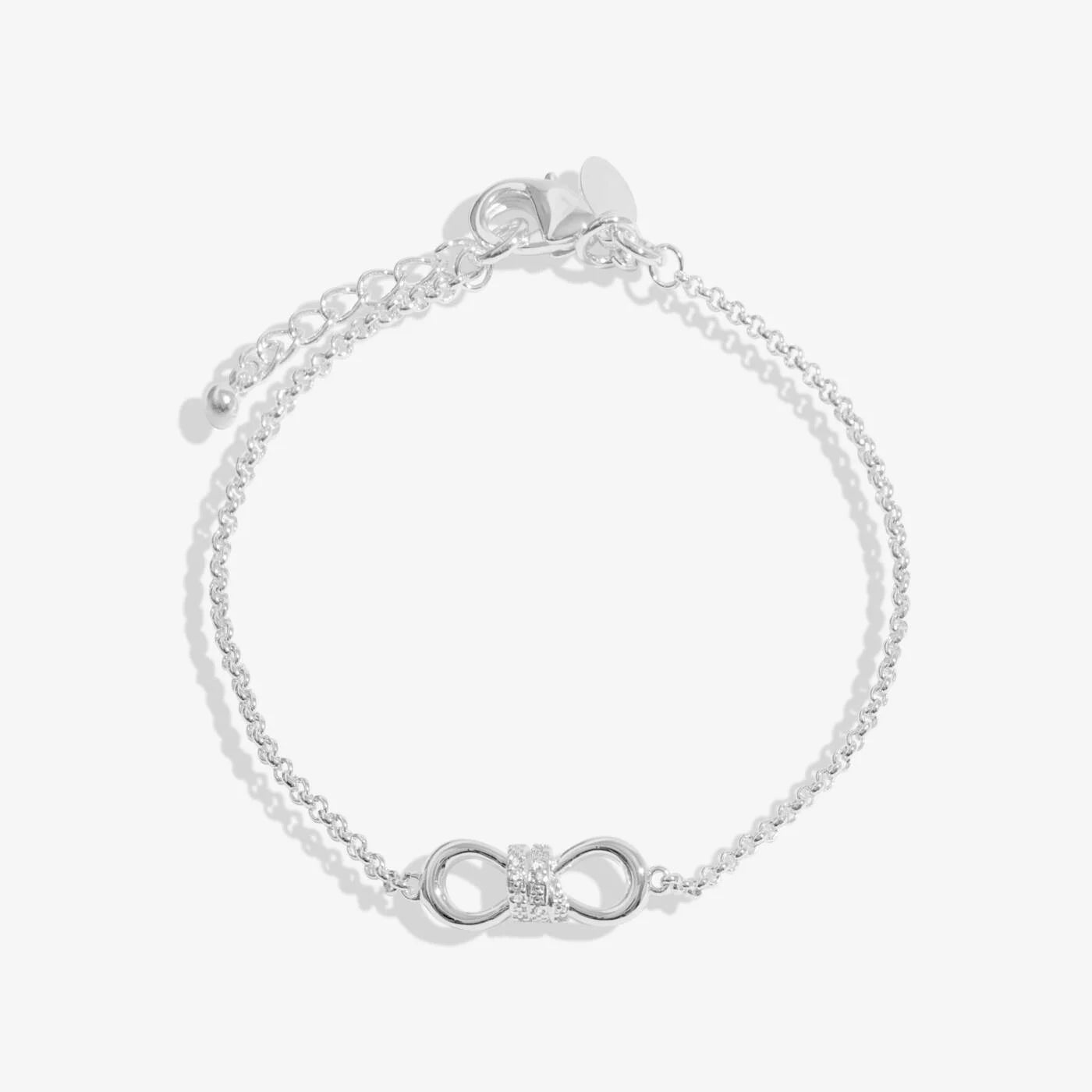 A LITTLES & CO Evermore Infinity Knot bracelet in silver with a delicate infinity charm and sleek, minimalist design.