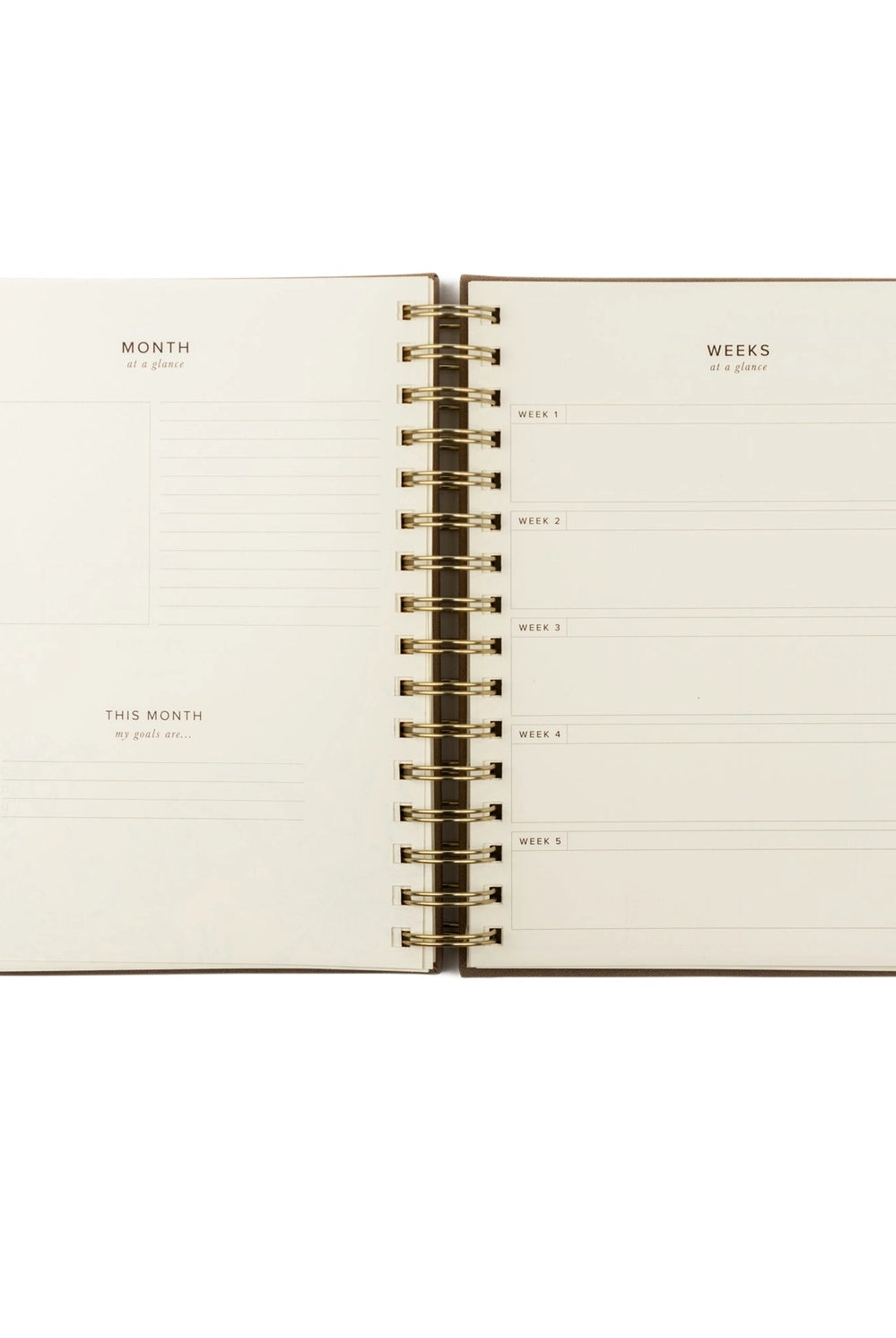 Undated 12-month planner by HOSANNA REVIVAL with a minimalist cover design, ideal for organizing schedules and appointments.