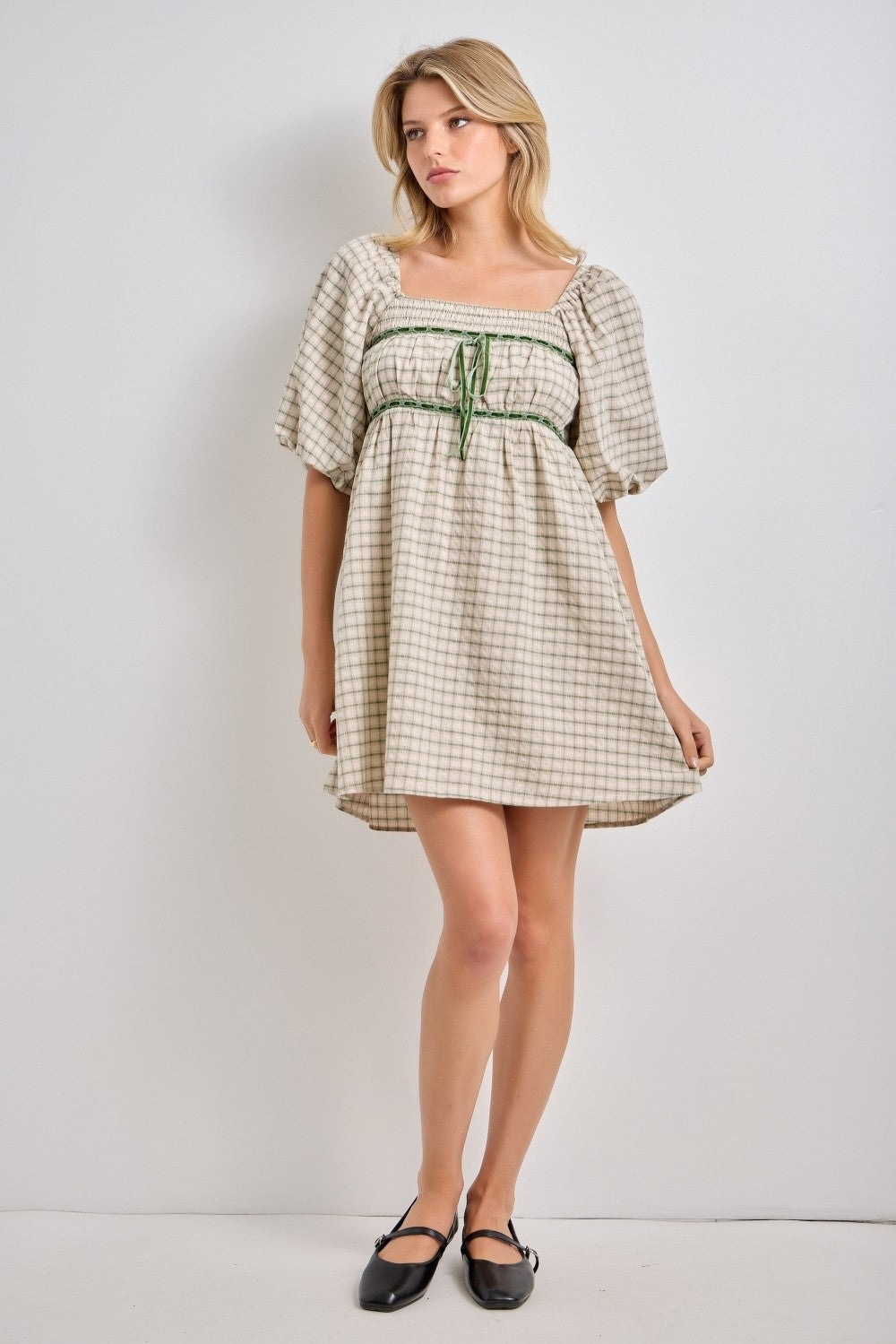 BAVELY Lydia lace trim plaid dress featuring a stylish fit-and-flare design with lace details, suitable for dressy occasions.