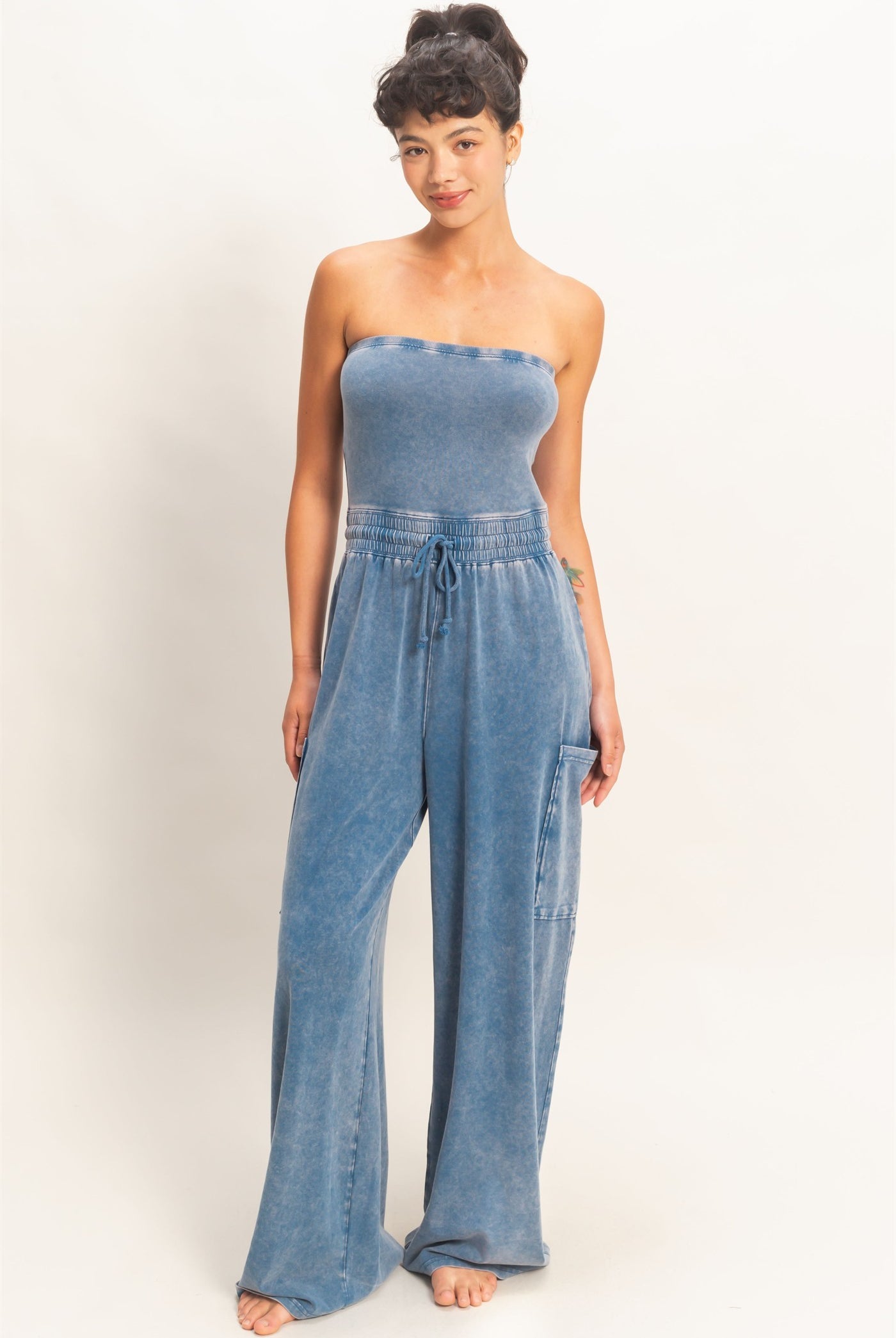 HYFVE Joni Strapless Mineral Washed Jumpsuit from 153 Rompers, featuring a relaxed strapless design and mineral wash finish.