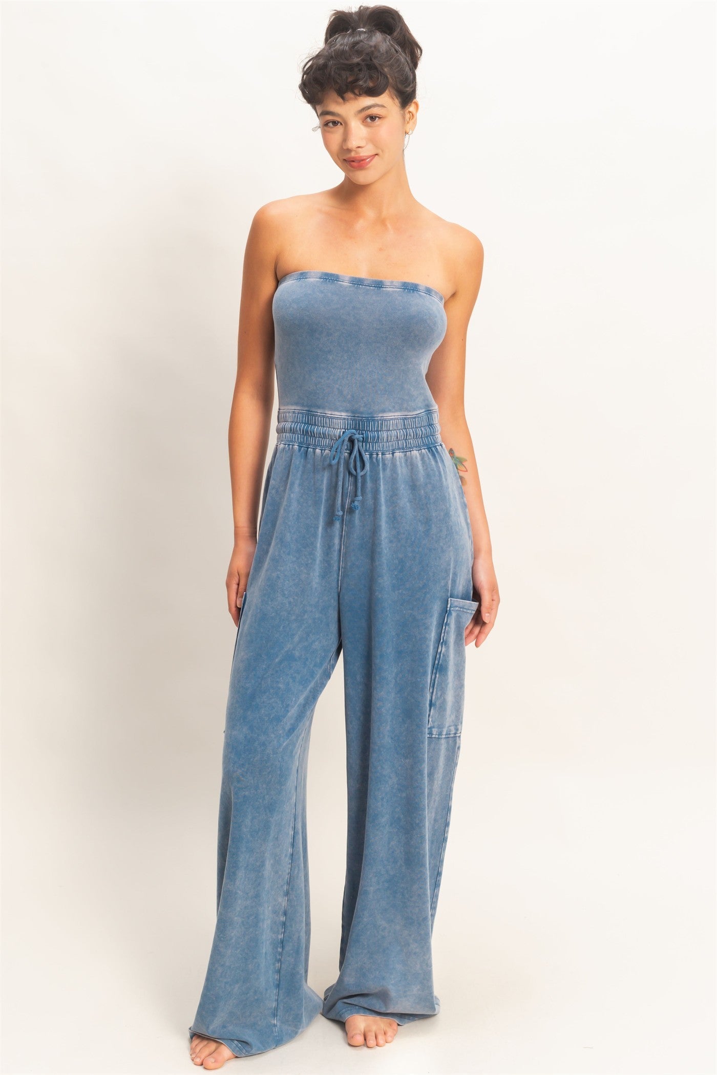 HYFVE Joni Strapless Mineral Washed Jumpsuit from 153 Rompers, featuring a relaxed strapless design and mineral wash finish.