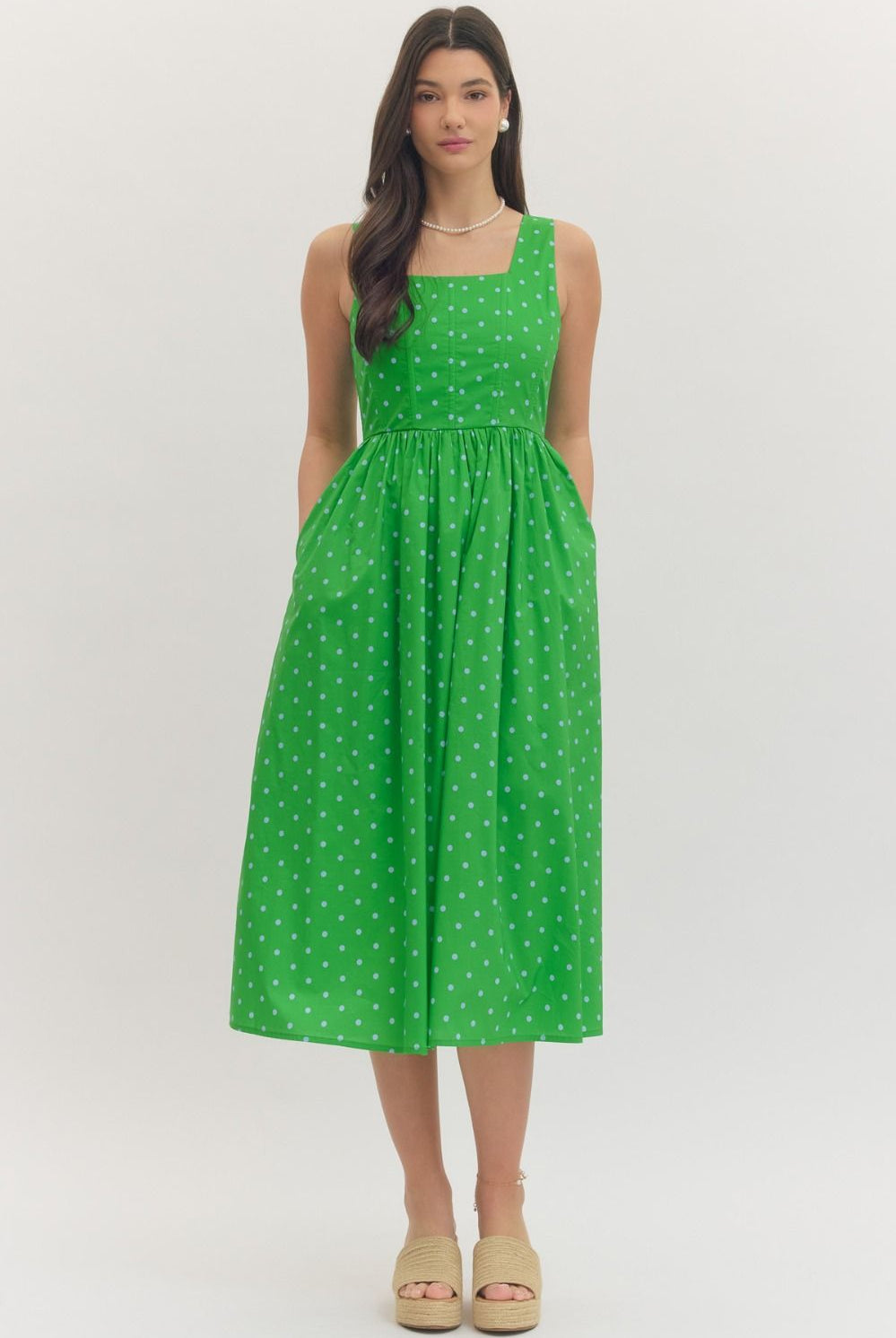 ENTRO Jackie Polka Dot Midi Dress featuring a classic pattern, casual fit, and elegant design perfect for everyday wear.