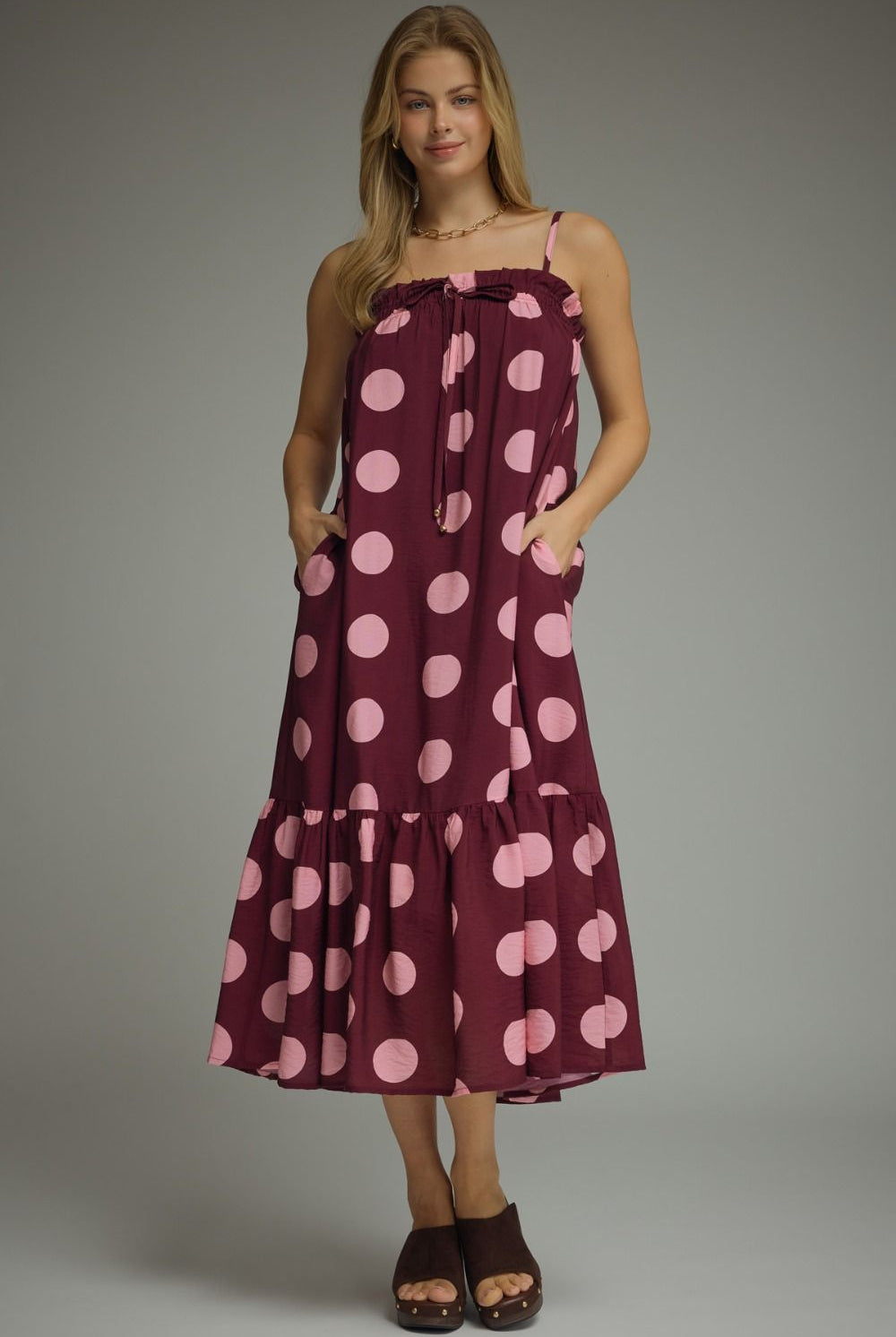ENTRO Ashton polka dot midi dress with a fitted bodice and flowy skirt, perfect for dressy occasions.