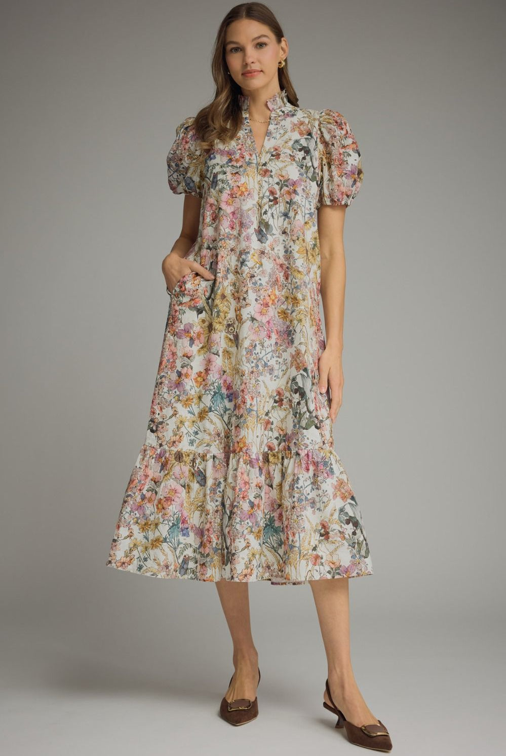 Entro Callie floral eyelet midi dress with a fitted bodice and flowing skirt, featuring delicate floral embroidery and eyelet details.