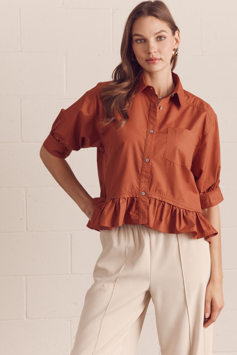 Entro Carrie Clay button-down top with ruffle hem, stylish dressy blouse in soft fabric, shown in a flattering close-up.