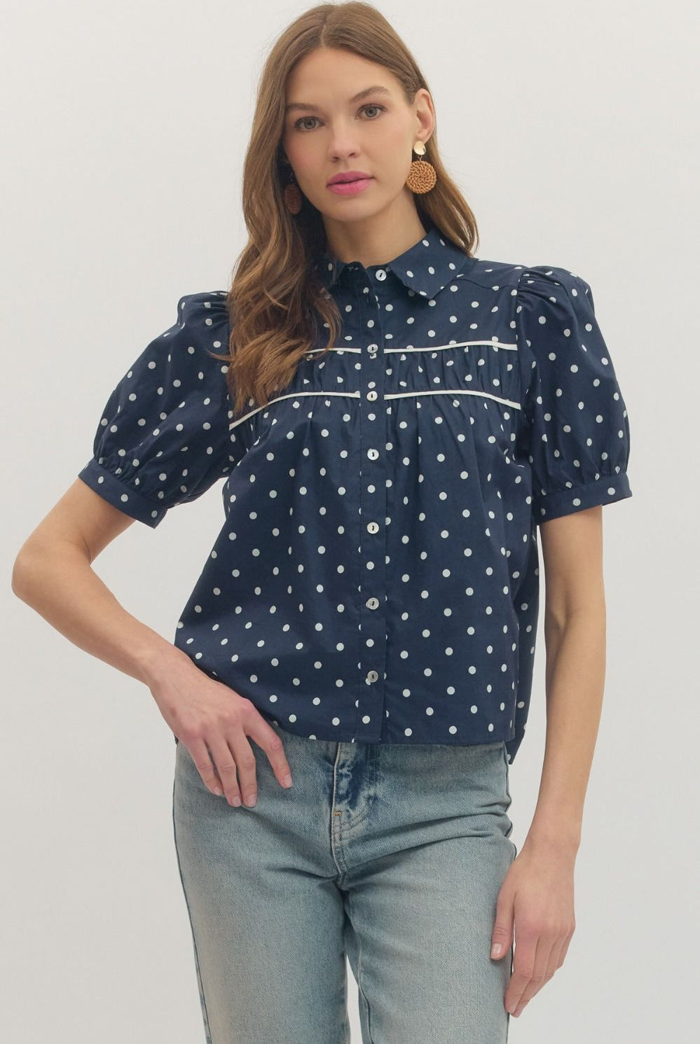 Navy polka dot blouse top by ENTRO, a stylish dressy top with a flowy fit and long sleeves, perfect for casual or semi-formal wear.