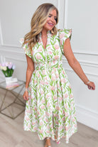 ENTRO Carson botanical floral printed dress, 125 dressy dress with vibrant floral pattern, displayed on a hanger.