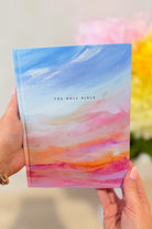 HOSANNA REVIVAL NLT Rosemary Notetaking Bible open with handwritten notes and highlighted passages on cream paper pages.