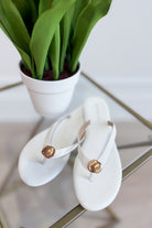 Berness Kellen white sandal with open toe and ankle strap, casual footwear for summer, on a neutral background.