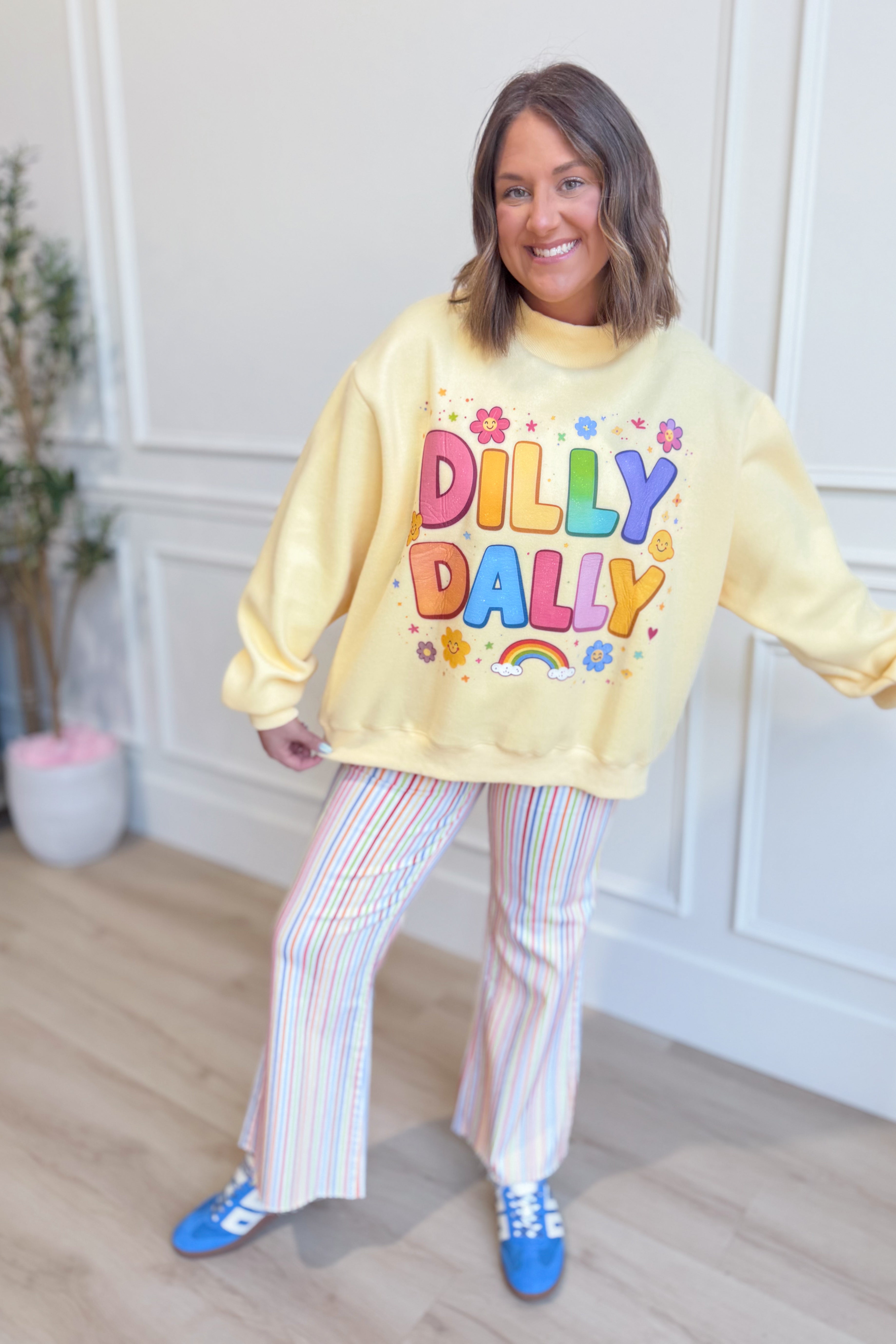 Rainbow reversible mock neck sweatshirt from BUCKET LIST's Dilly Dally 137 Graphic Sweatshirts collection, featuring vibrant rainbow design.