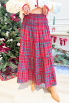 TWENTIFOURTH Sutton plaid tiered midi skirt featuring a stylish layered design and classic plaid pattern.