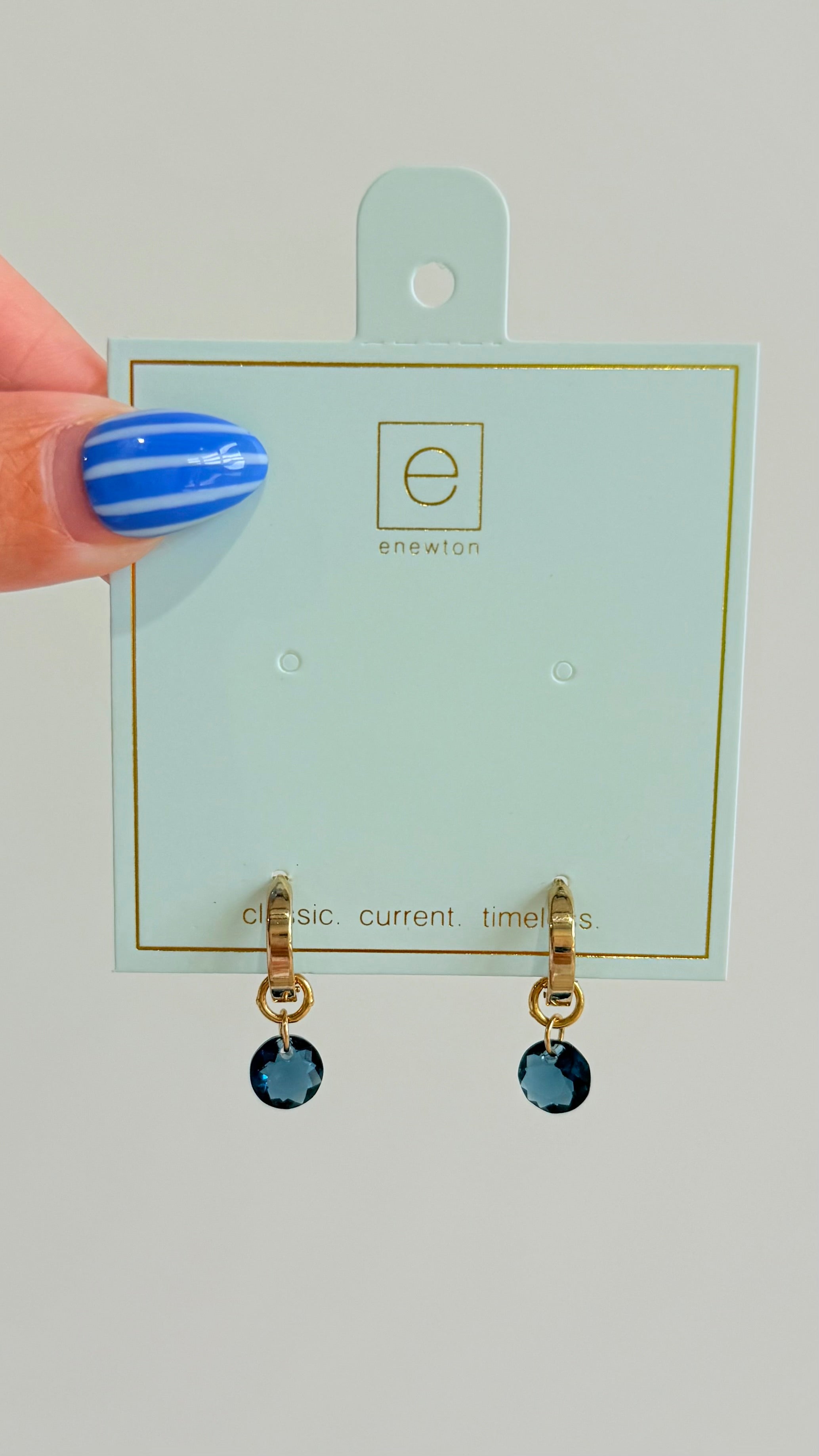 Enewton .5mm Classic Birthstone Huggie earrings featuring small, sparkling gemstone accents and a silver-tone finish.
