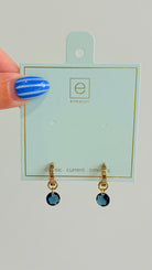 Enewton .5mm Classic Birthstone Huggie earrings featuring small, sparkling gemstone accents and a silver-tone finish.