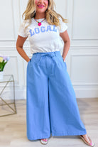 WISHLIST Reese wide-leg drawstring pants in 156 style, featuring a relaxed fit with a comfortable waistband and flowing fabric.