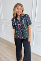 Jodifl Lonny floral printed top with a stylish design, featuring vibrant floral patterns on lightweight fabric.