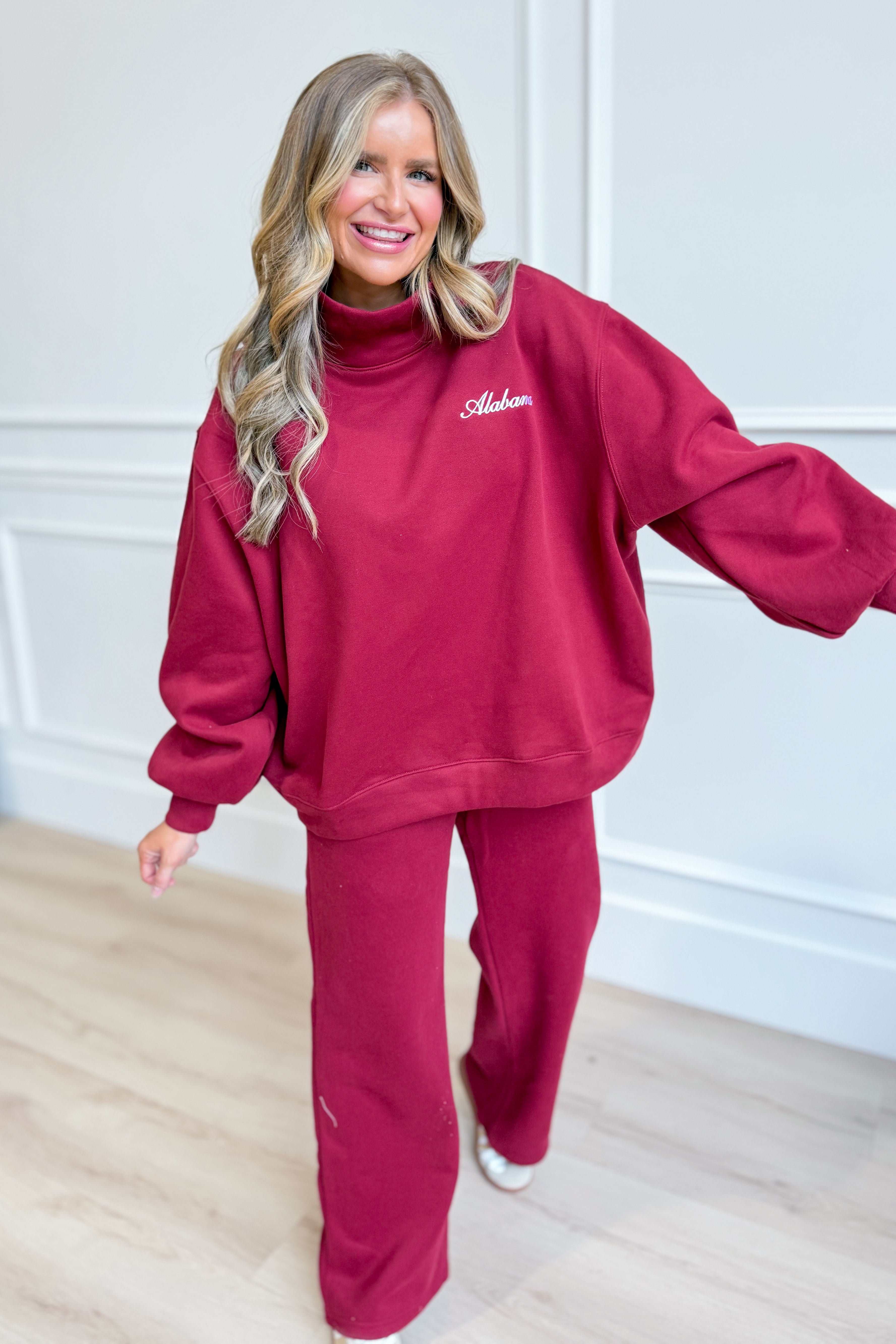 Crimson mock neck sweatshirt from BUCKET LIST's 137 Graphic Sweatshirts collection, showing a comfortable, stylish rolled design.